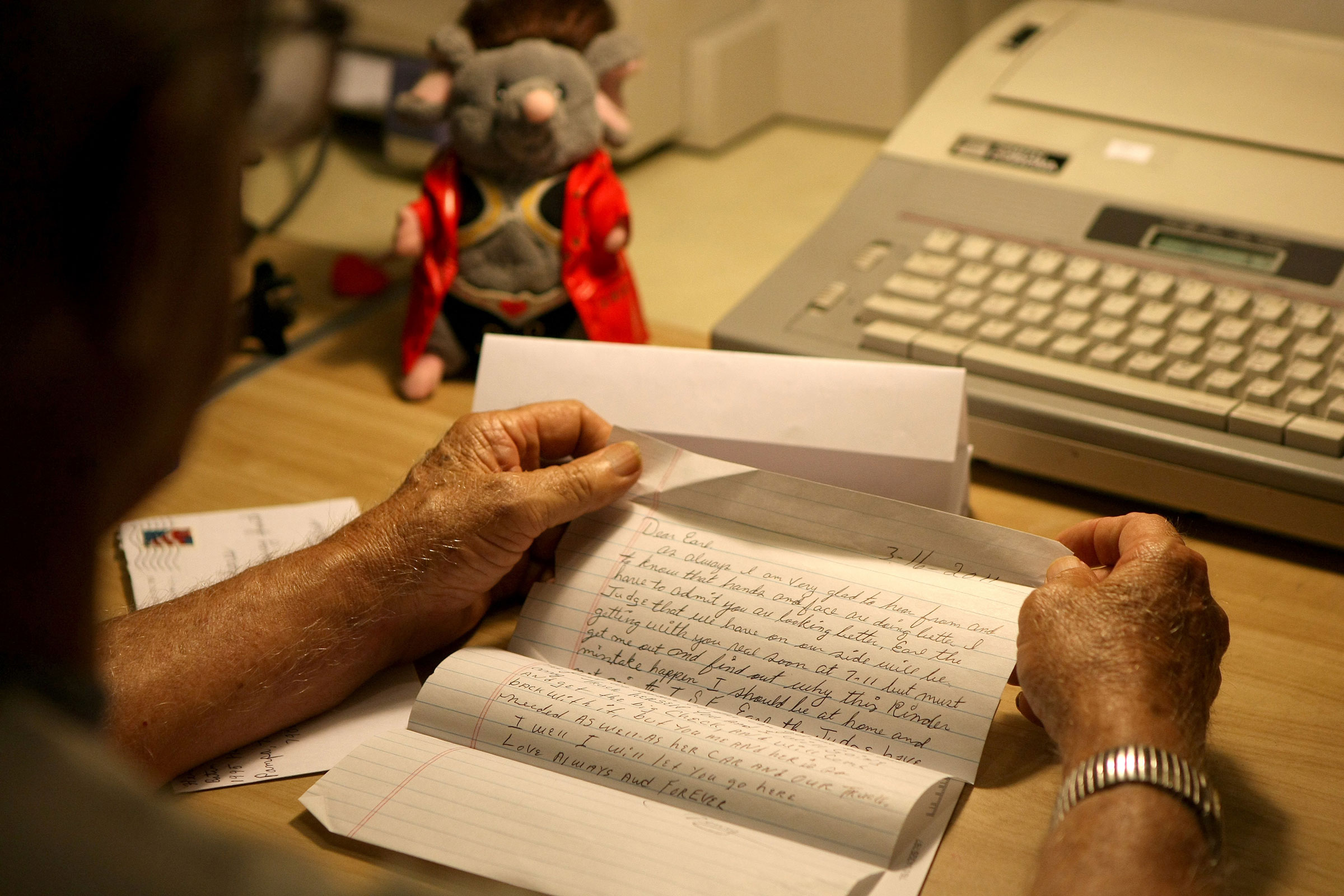 A man writes letters to pen pals in prison, shown in Fort Worth, Texas, on April 12, 2011. Texas is the latest state to move toward digital mail for its prisoners. (Khampha Baouphanh—Fort Wort Star-Telegram/Tribune News Service/Getty Images)