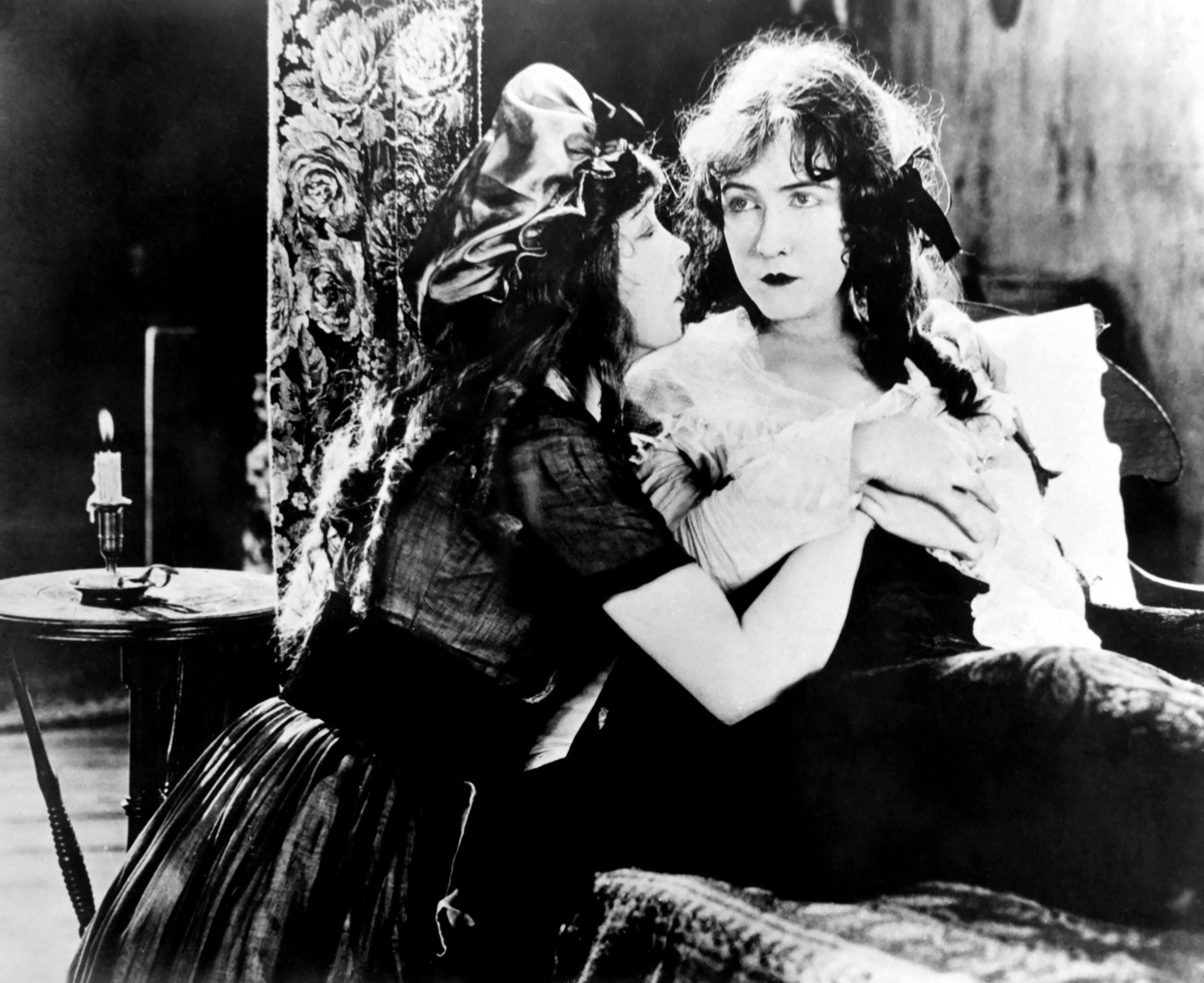 Lillian Gish (left) and Dorothy Gish in <i>Orphans of the Storm</i>. (Everett Collection)