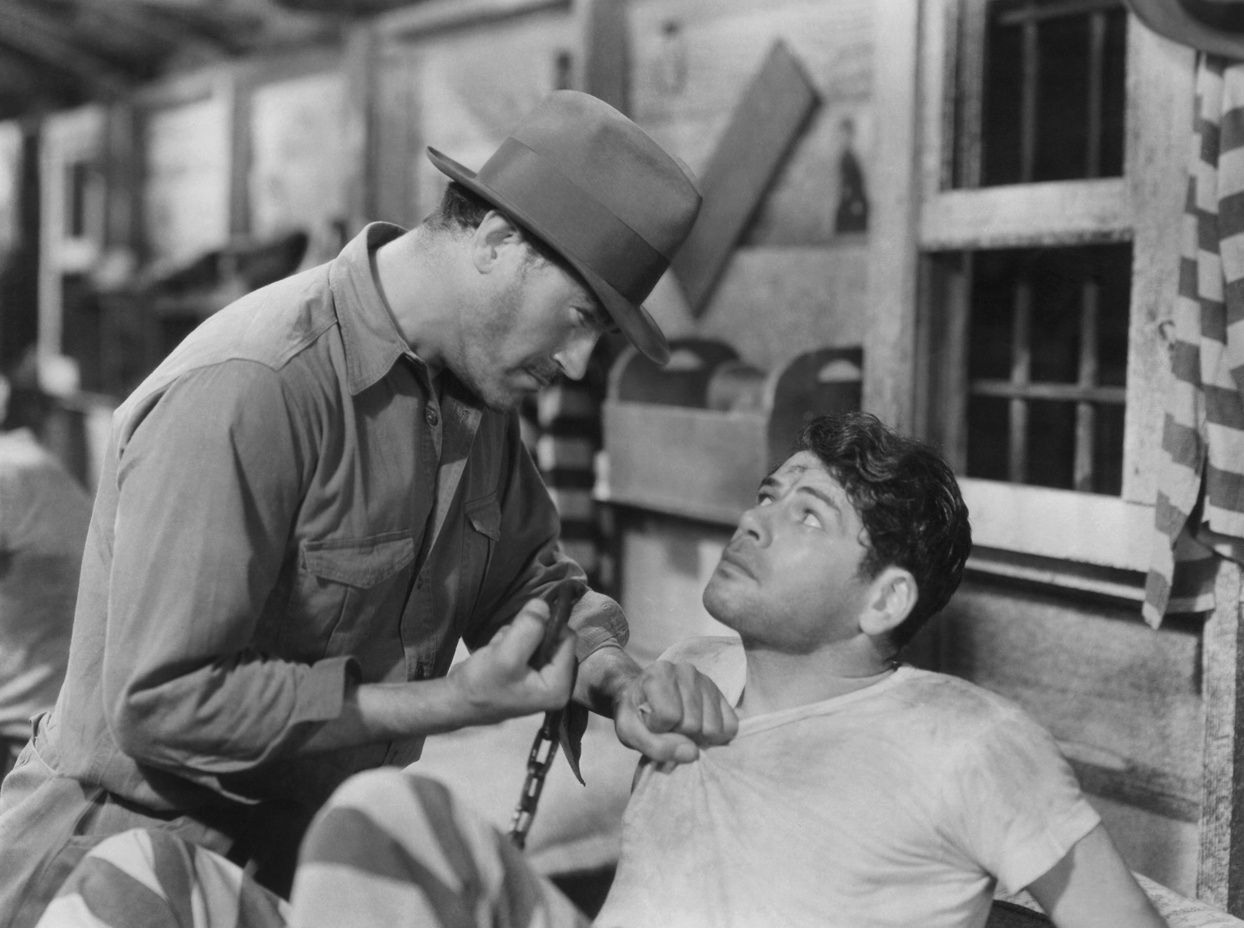 Harry Woods and Paul Muni in <i>I Am a Fugitive from a Chain Gang</i>. (Everett Collection)