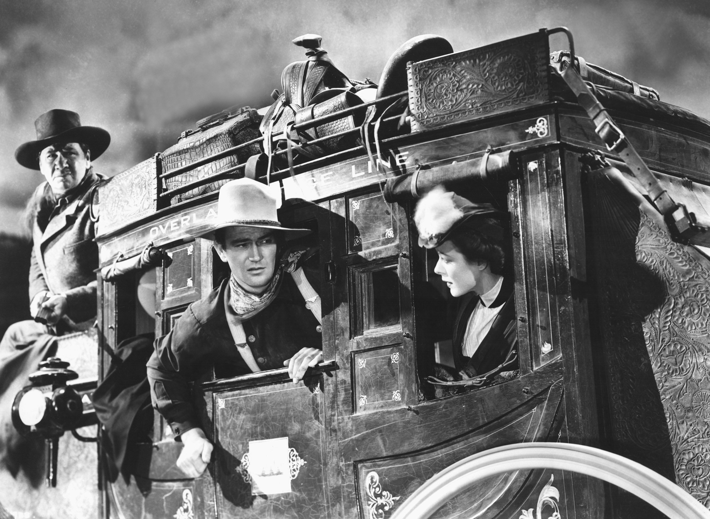 George Bancroft, John Wayne, and Louise Platt in <i>Stagecoach</i>. (20th Century Fox/Everett Collection)