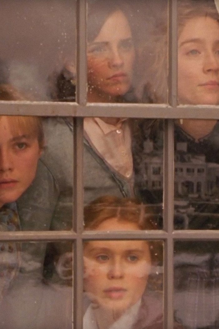 Emma Watson as Meg, Saoirse Ronan as Jo, Eliza Scanlen as Beth, and Florence Pugh as Amy in Little Women.