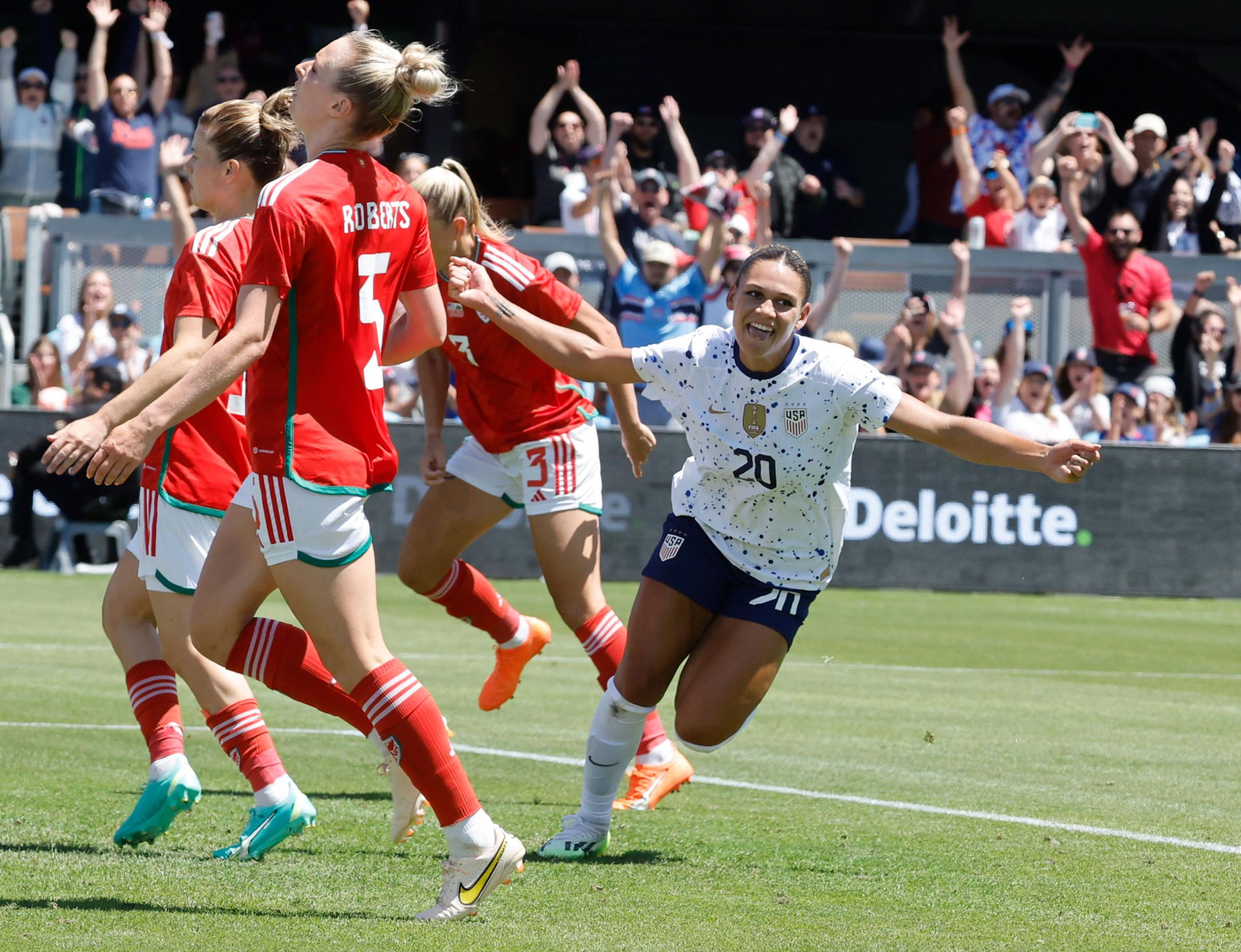 Trinity Rodman celebrates after scoring the first of her goals against Wales