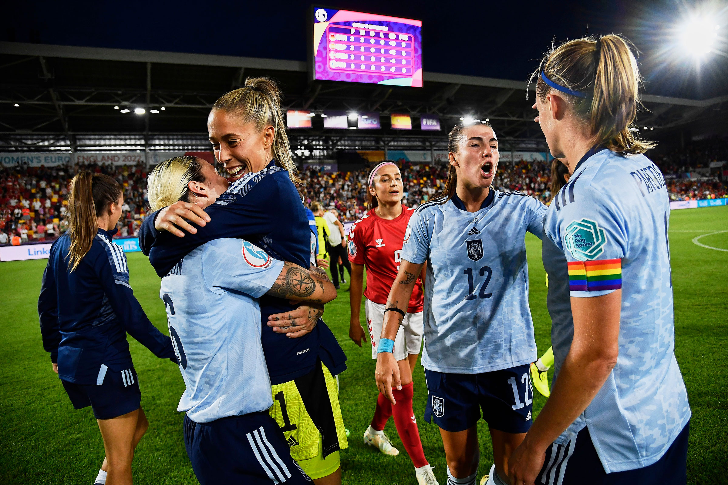 (L-R) Mapi Leon, Lola Gallardo, and Patricia Guijarro of Spain celebrate victory after the UEFA Women’s Euro England 2022 group B match between Denmark and Spain, at Brentford Community Stadium on July 16, 2022. Leon, Gallardo, and Guijarro are among players who will not be with the Spanish team at the Women’s World Cup. (Jose Breton—Pics Action/NurPhoto/Getty Images)