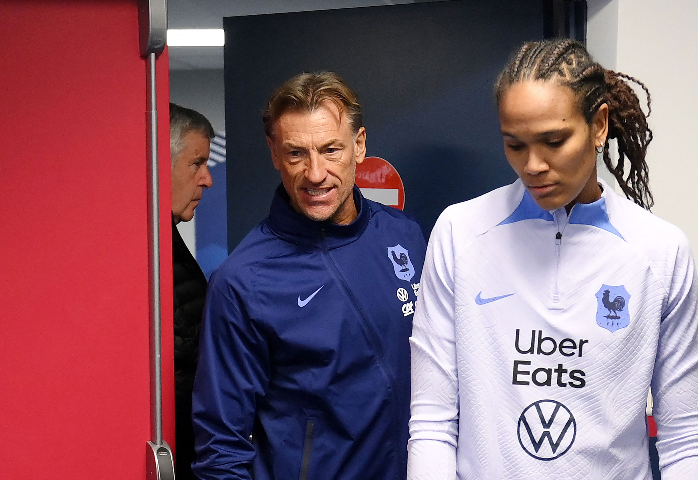France’s Women’s national football team head coach Hervé Renard and the team’s defender Wendie Renard arrive for a press conference