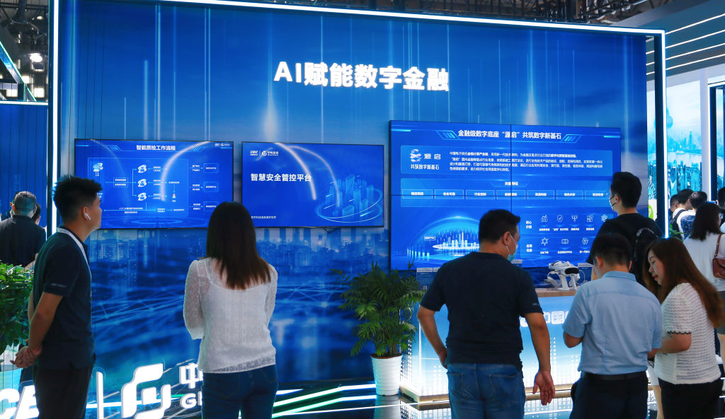 Visitors visit the China Electronics booth at the 2023 World Artificial Intelligence Conference in Shanghai, China, July 7, 2023.