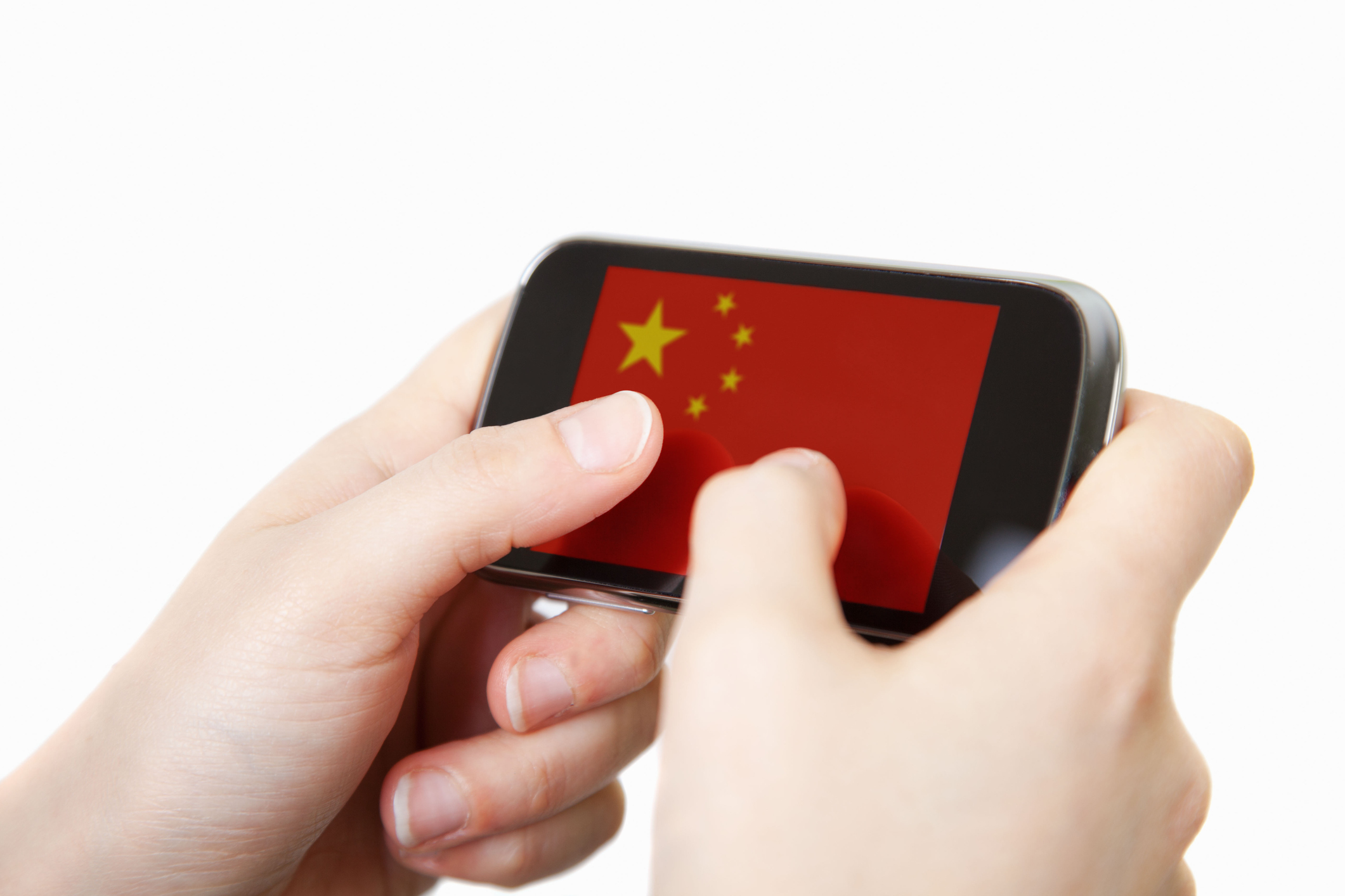 Close up of a human hand holding smart phone with the flag of China in the display.