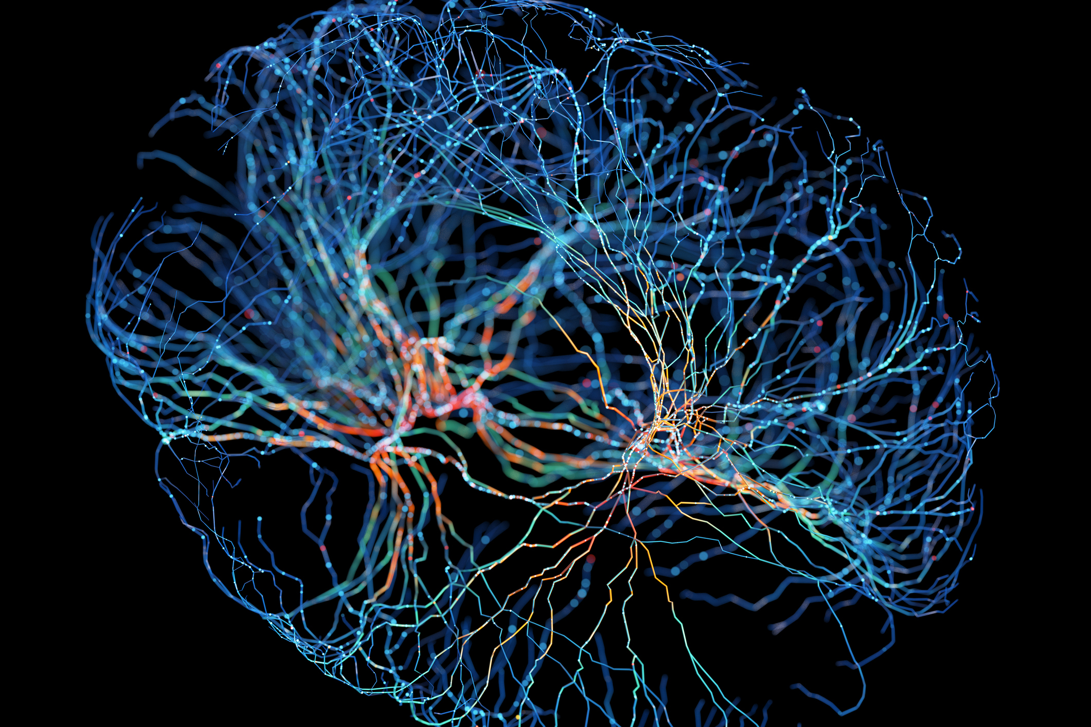 System of neurons with glowing connections on black background (Getty Images&mdash;© Andriy Onufriyenko)