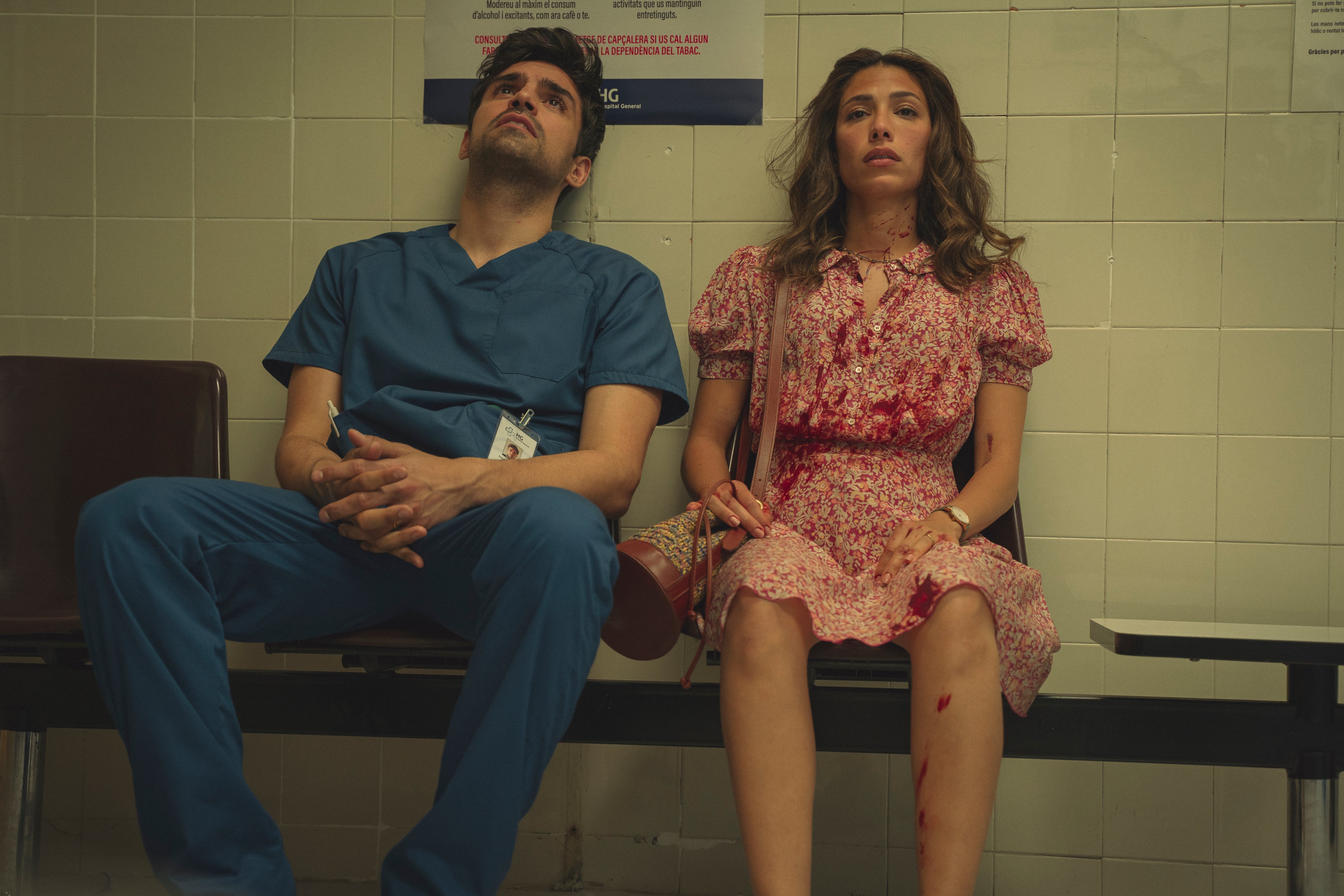 Sean Teale, left, and Evin Ahmad in <i>Who Is Erin Carter?</i> (Sam Taylor—Netflix)