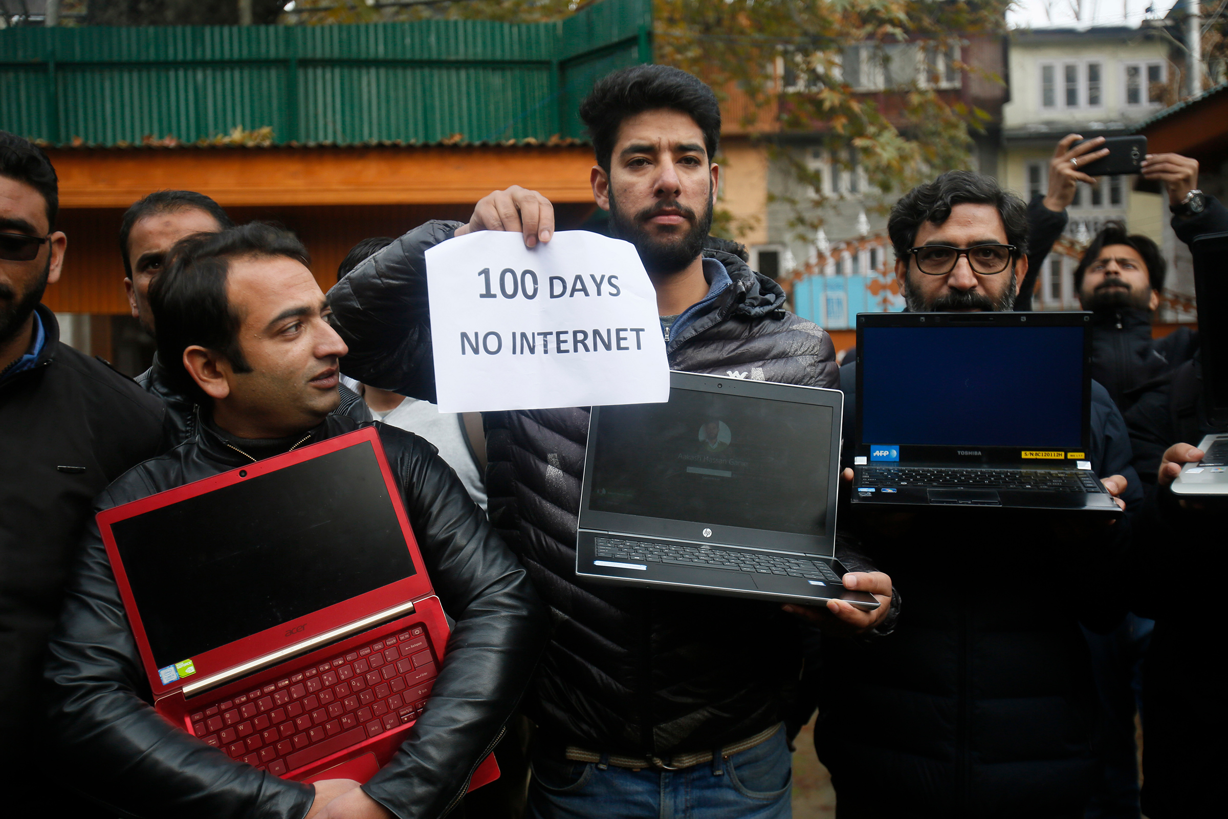 Kashmiri journalists hold placards and protest against 100 days of internet blockade in the region in Srinagar, Indian controlled Kashmir, on Nov. 12, 2019. Internet services have been cut since Aug. 5 when Indian-controlled Kashmir's semi-autonomous status was removed.