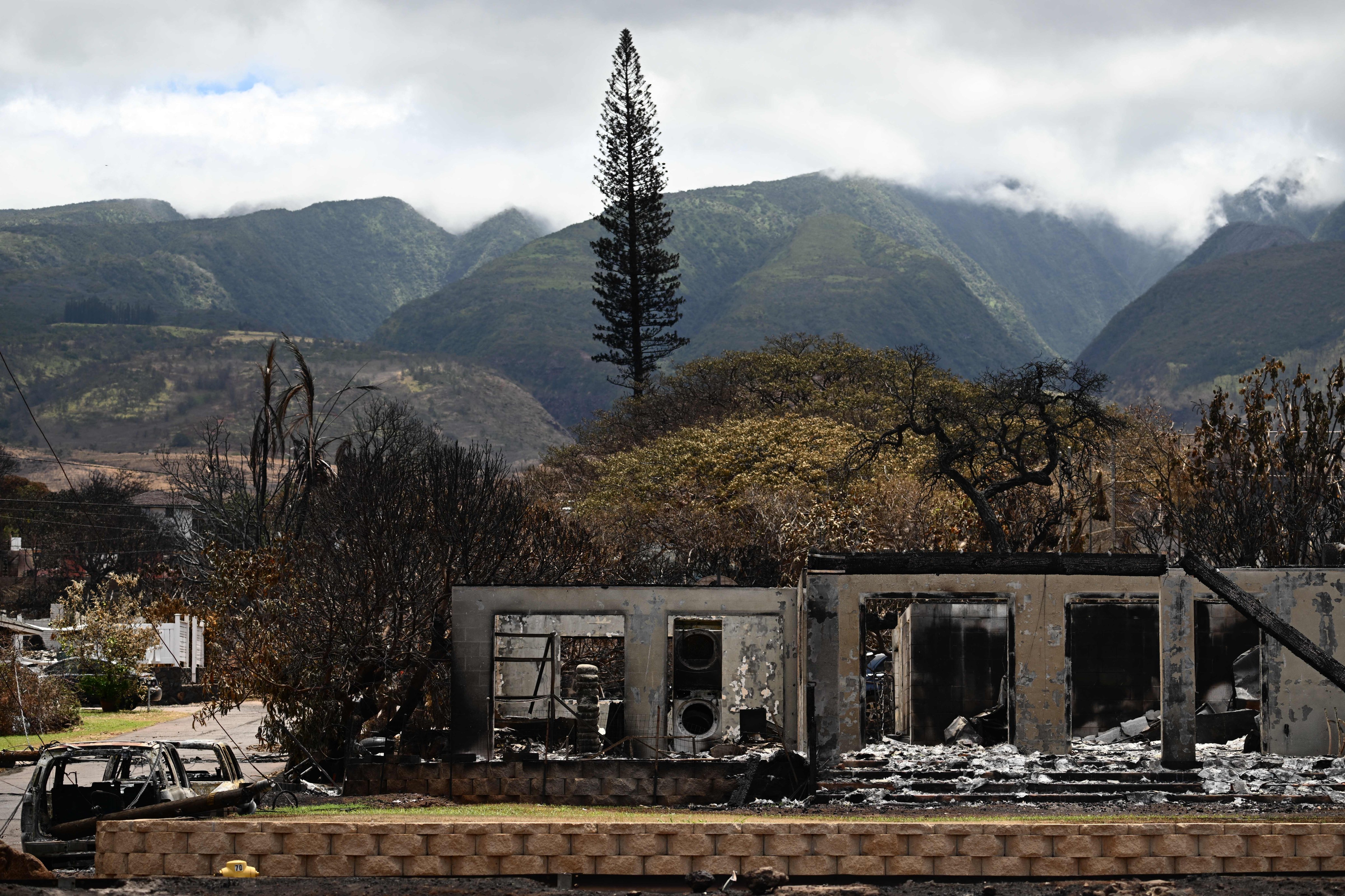 Destroyed homes and businesses are seen in the aftermath of the Maui wildfires in Lahaina, Hawaii, on August 16, 2023.  (PATRICK T. FALLON/AFP via Getty Images)