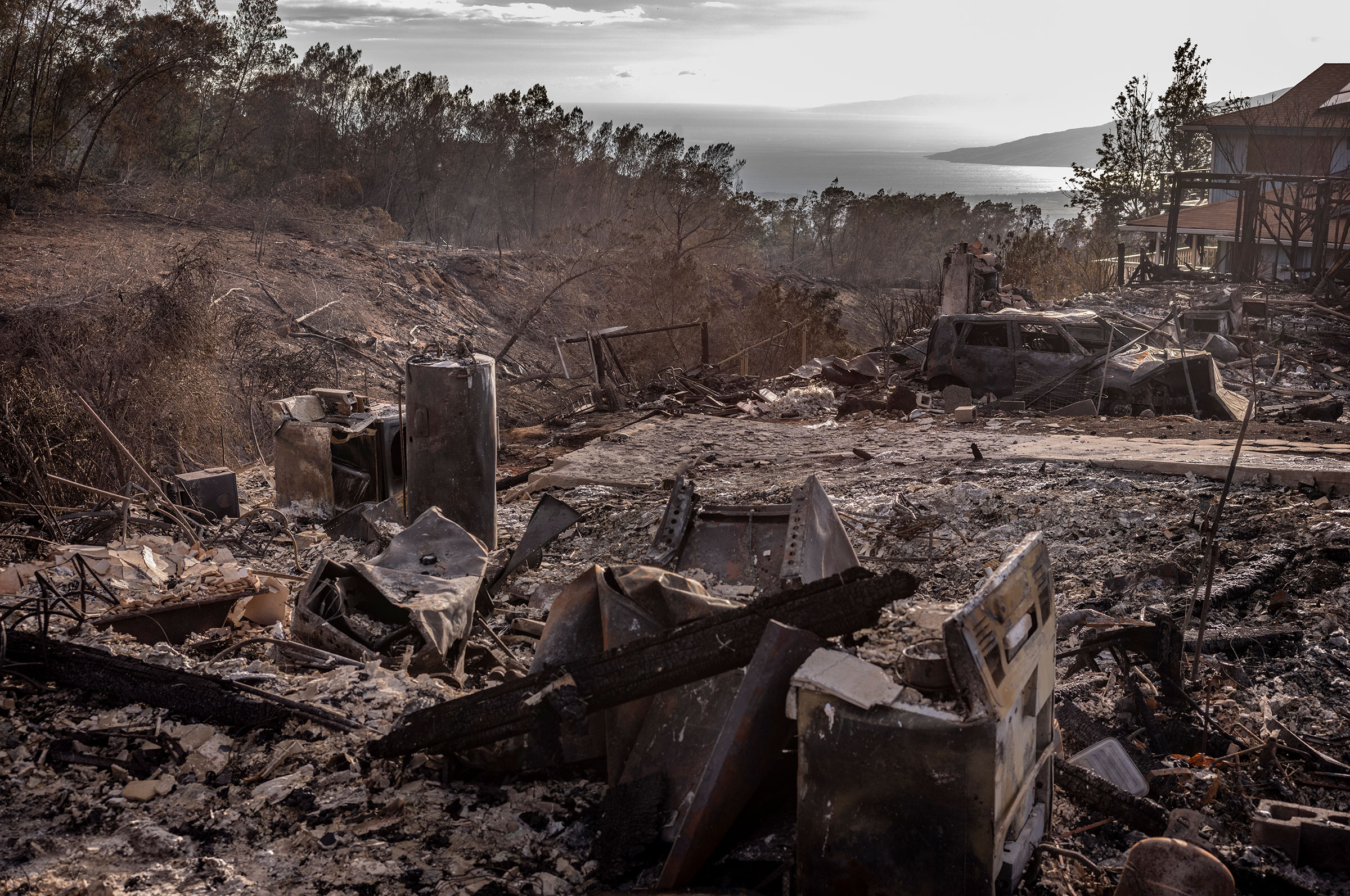 Ruins of a home in the small hillside town of Kula on Aug. 12, 2023. (David Butow for TIME)