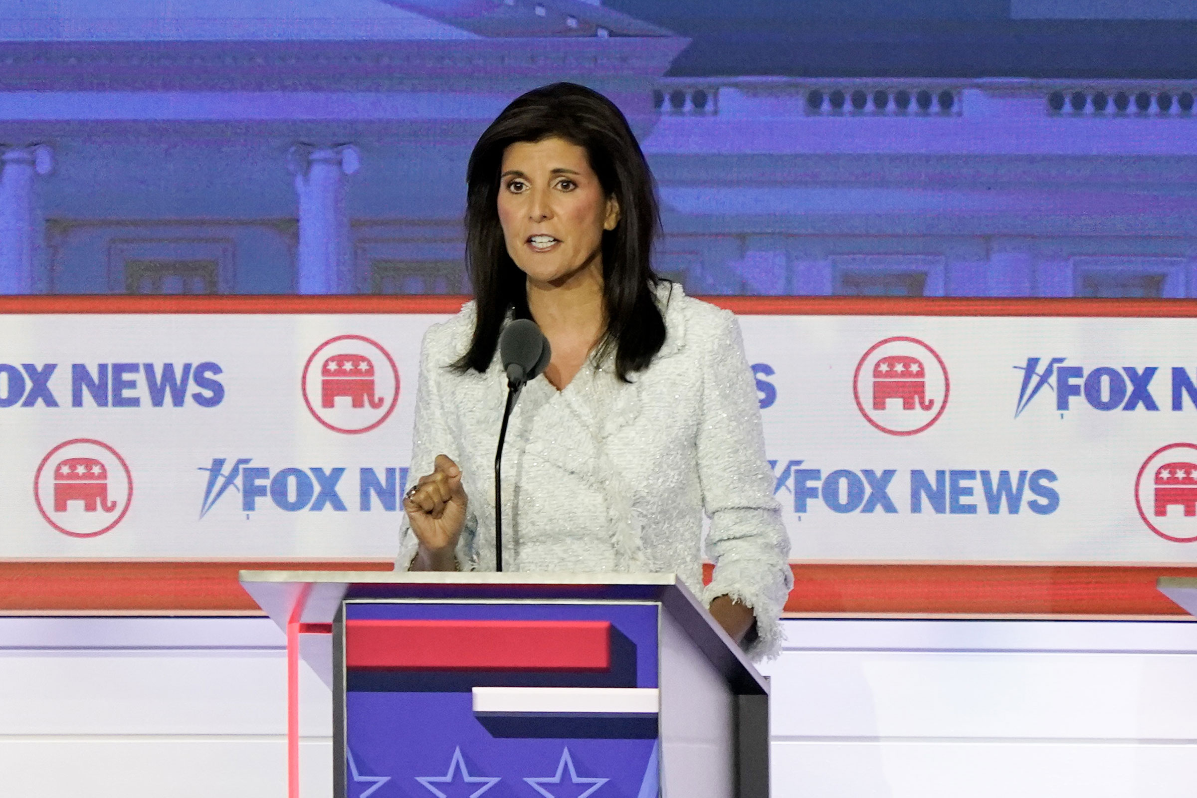 Nikki Haley, former ambassador to the U.N., behind a podium on stage during the primary presidential debate