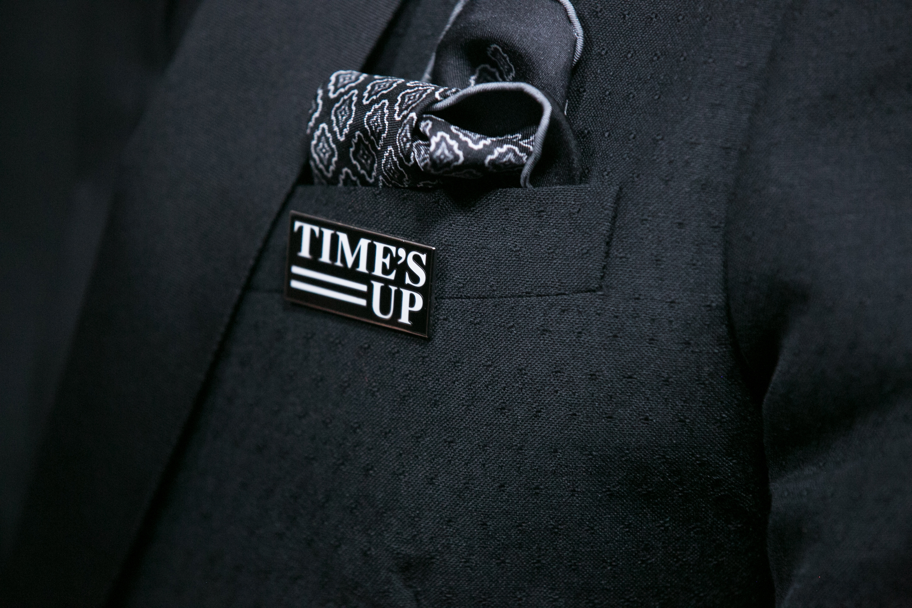 Gary Oldman wears a Time's Up pin to the Golden Globes on January 7, 2018 (Gabriel Olsen—FilmMagic)