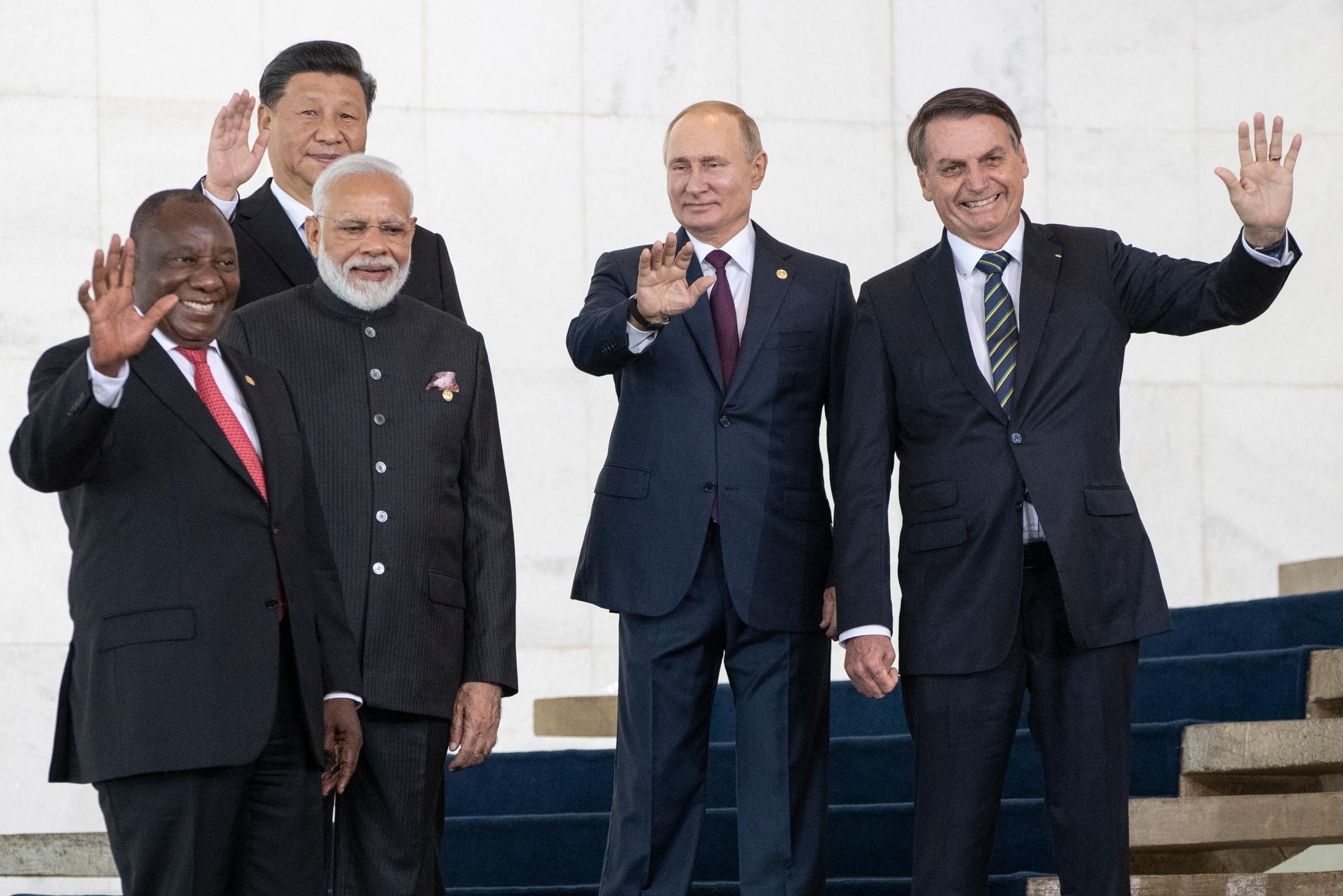 From left to right, South Africa's President Cyril Ramaphosa, China's President Xi Jinping, India's Prime Minister Narendra Modi, Russia's President Vladimir Putin and Brazil's President Jair Bolsonaro pose for a photo at the BRICS emerging economies at the Itamaraty palace in Brasilia, Brazil, Thursday, Nov. 14, 2019.