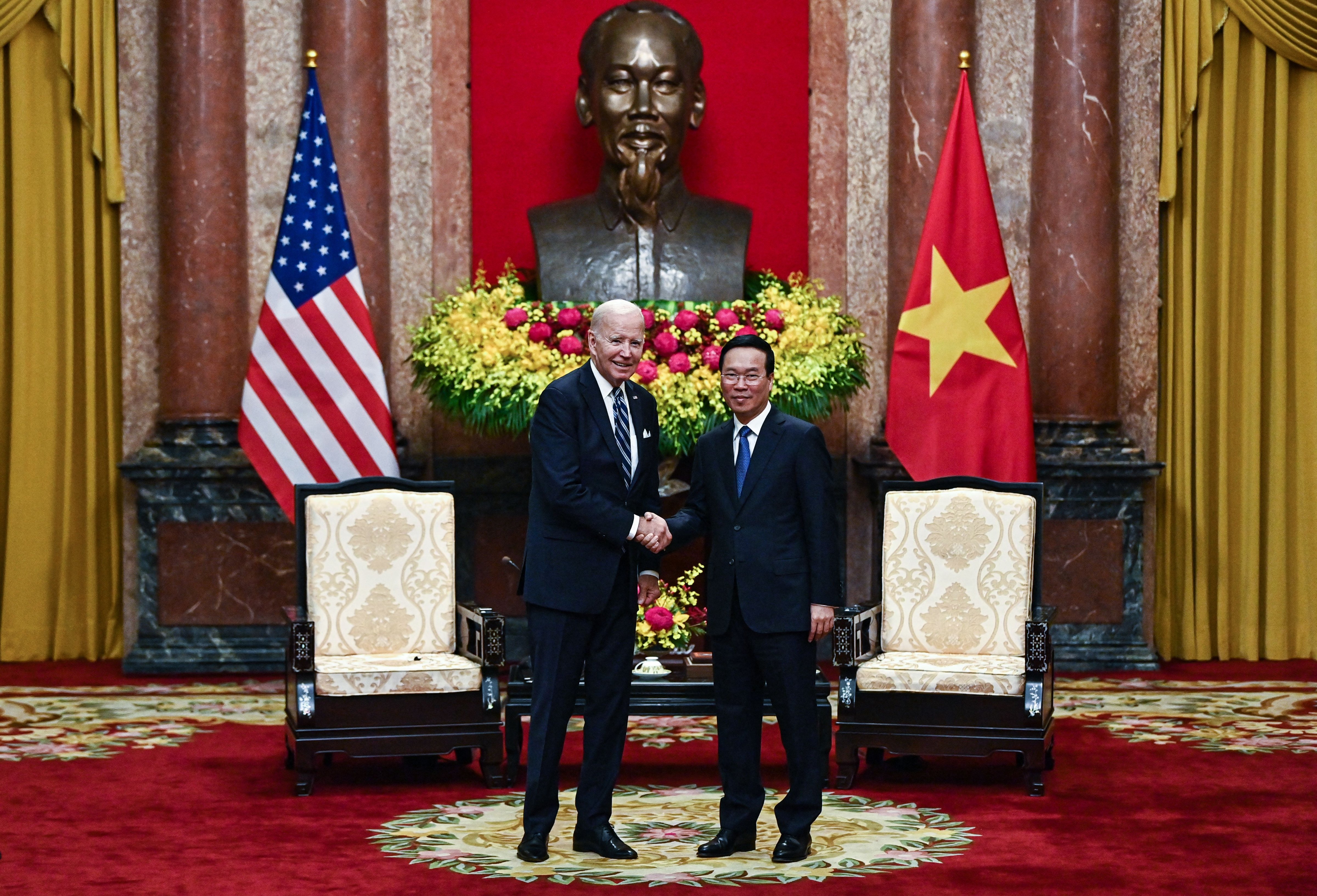 U.S. President Joe Biden shakes hands with Vietnam's President Vo Van Thuong at the Presidential Palace in Hanoi on September 11. (Nhac Nguyen—AFP/ Getty Images)