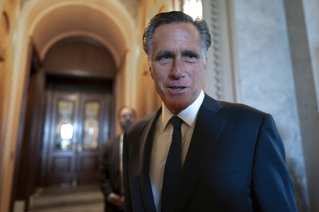 Sen. Mitt Romney, R-Utah, and other senators arrive at the chamber for votes, at the Capitol in Washington, Wednesday, Sept. 6, 2023.  (J. Scott Applewhite—AP)
