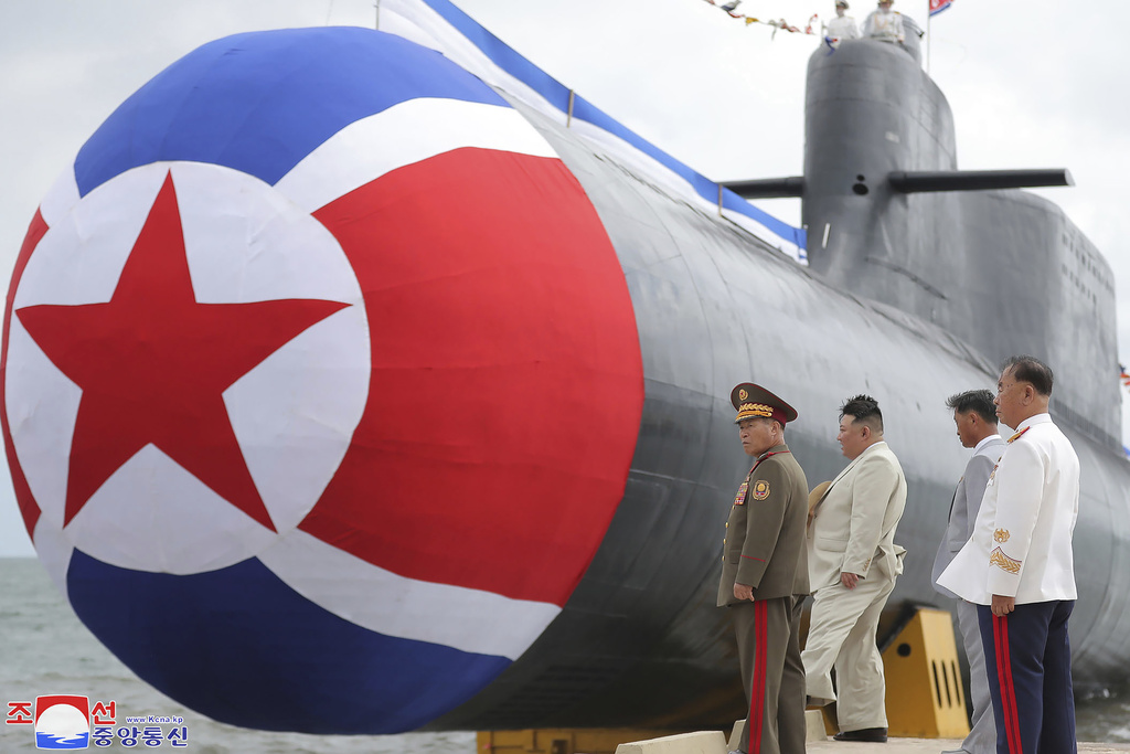 North Korean leader Kim Jong Un inspects a submarine