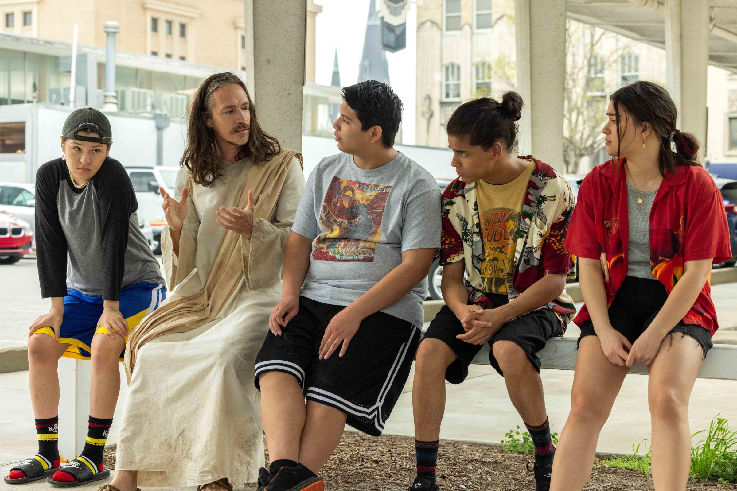 RESERVATION DOGS -- “BUSSIN” -- Season 3, Episode 1 (Airs Wednesday, August 2nd) — Pictured: (l-r) Paulina Alexis as Willie Jack, Brandon Boyd as White Jesus, Lane Factor as Cheese, D’Pharaoh Woo-A-Tai as Bear, Devery Jacobs as Elora Danan. CR: Shane Brown/FX.