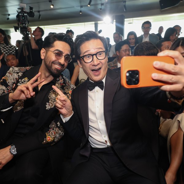 Ayushmann Khurrana (L) and Ke Huy Quan (R) poses for a photo during the TIME100 Impact Awards in Singapore on  on September 17, 2023.