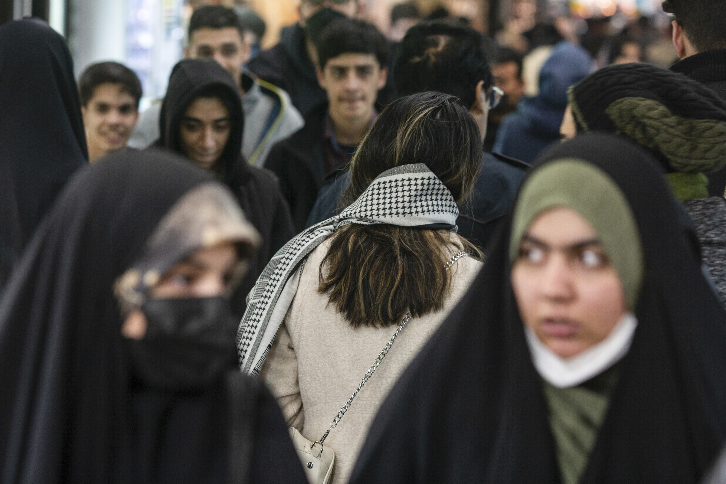 A woman, sans-head covering, at the Tajrish Bazaar in Tehran, Iran, Jan. 28, 2023.  (Arash Khamooshi—The New York Times/Redux)