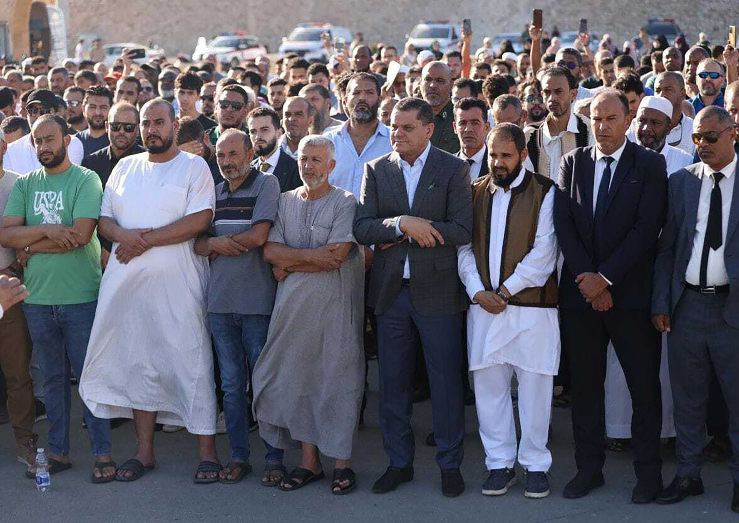Prime Minister of Libya under the Government of National Unity Abdul Hamid al-Dbeibeh, fourth from right, is seen during a funeral prayer in memory of those who lost their lives due to the flood disaster in the country in Tripoli on Sept. 12. (Libyan Government of National Unity/Anadolu Agency/Getty Images)