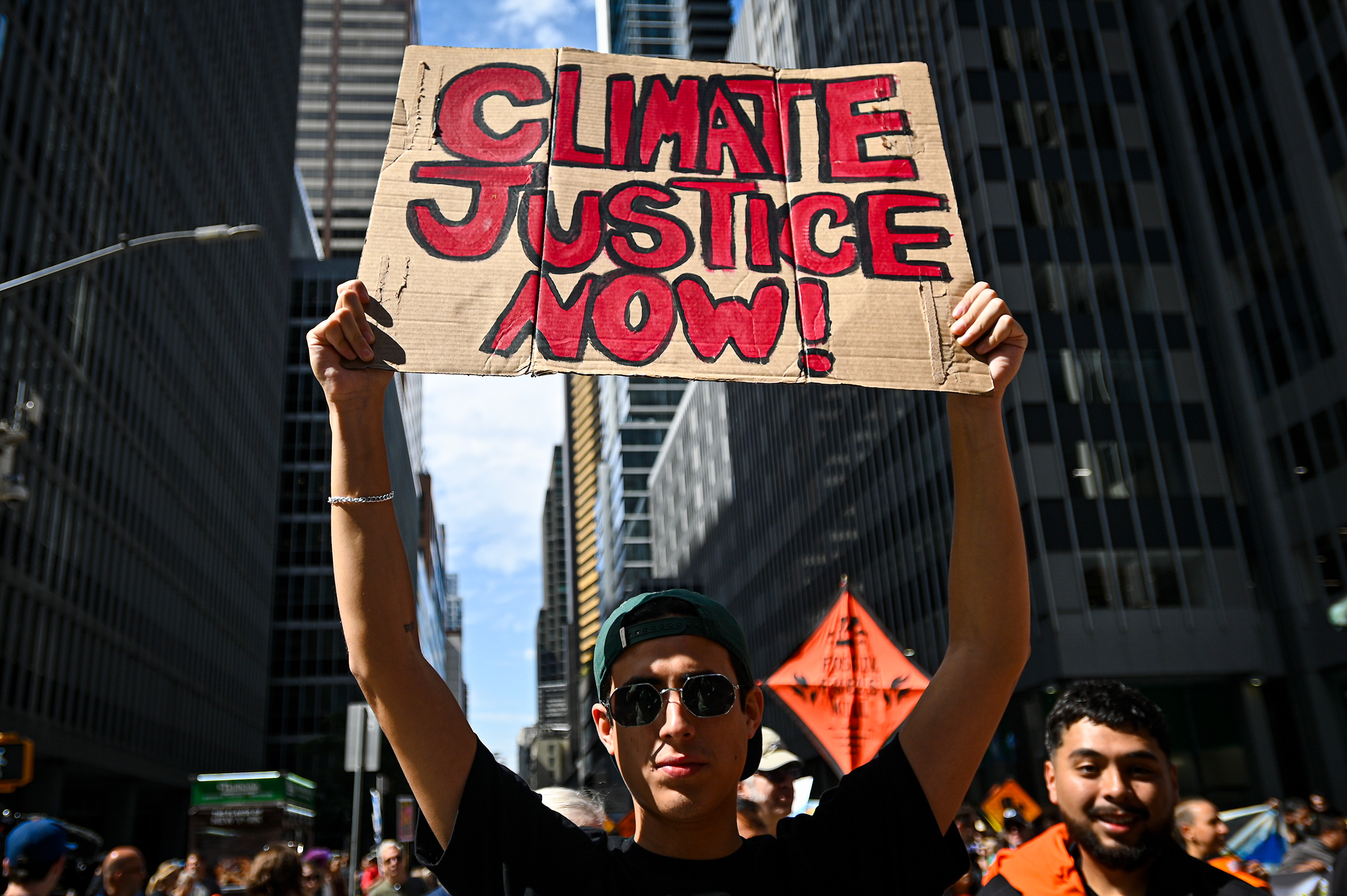 Climate activists attend the march against fossil fuels in midtown Manhattan on September 17, 2023 in New York City. (Miguel J. Rodríguez Carrillo—VIEWpress/Getty Images)