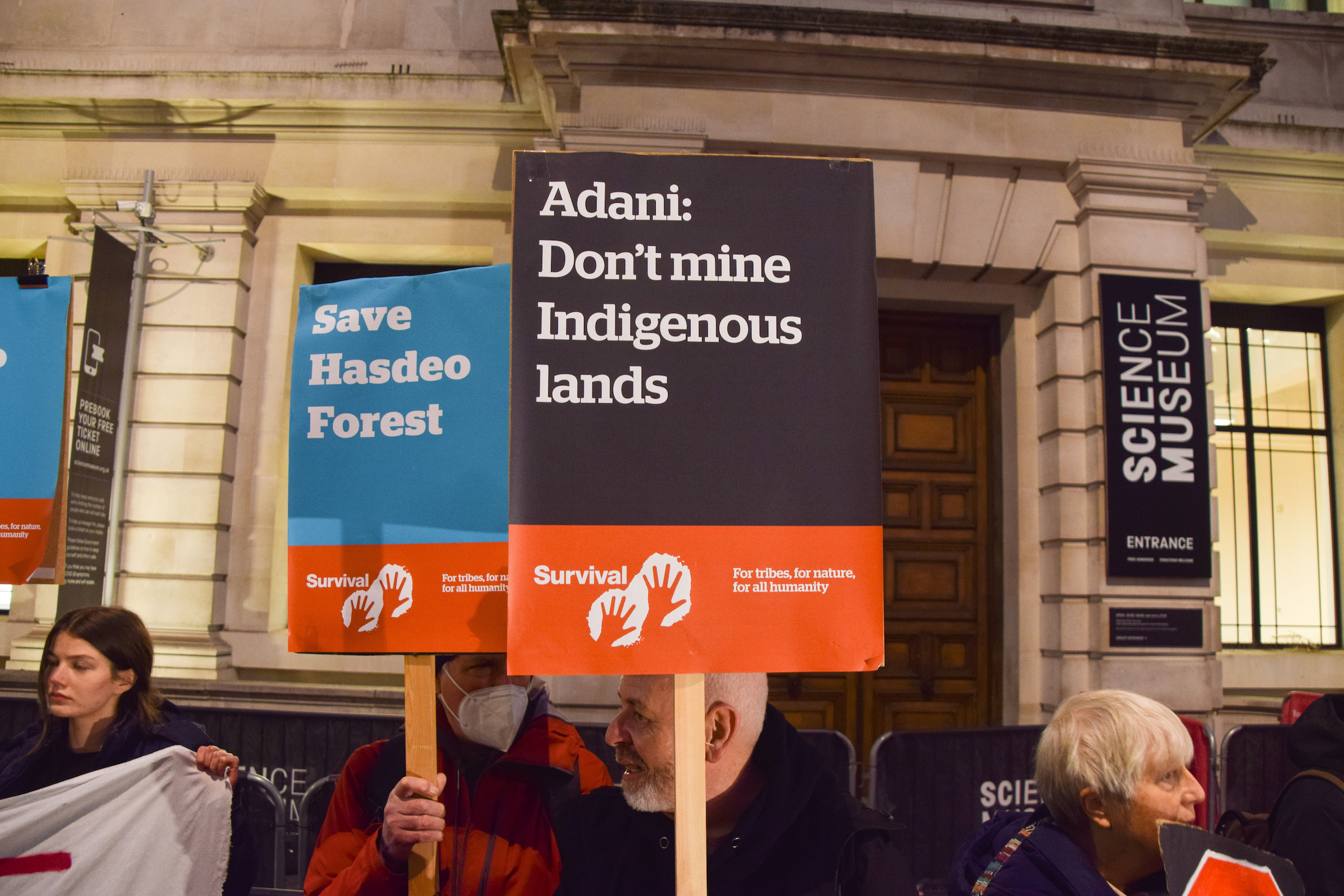 Demonstrators hold 'Save Hasdeo Forest' and 'Adani: Don't