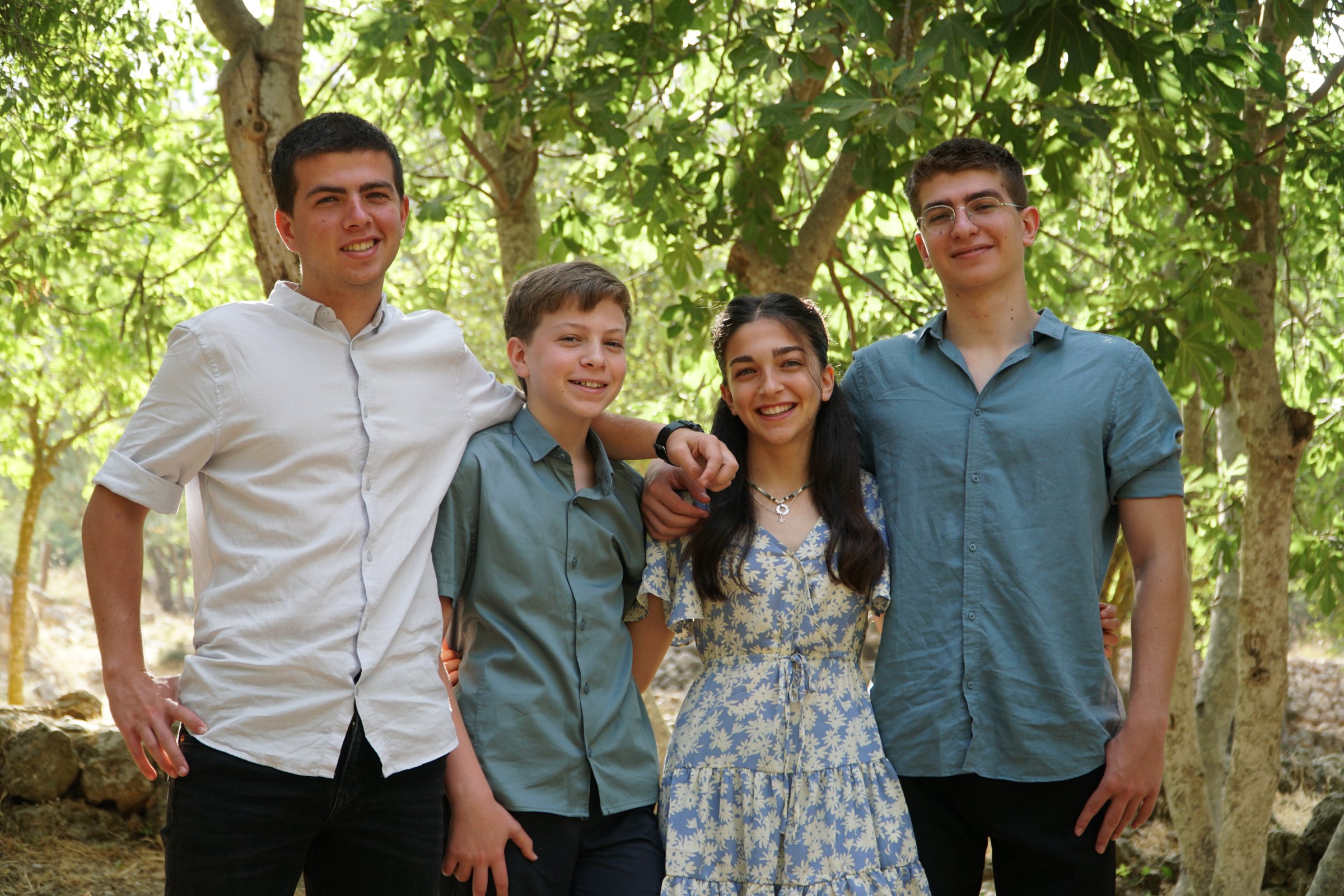 Yannai Kaminka (left) with his four siblings at his brother's Bar Mitzvah.