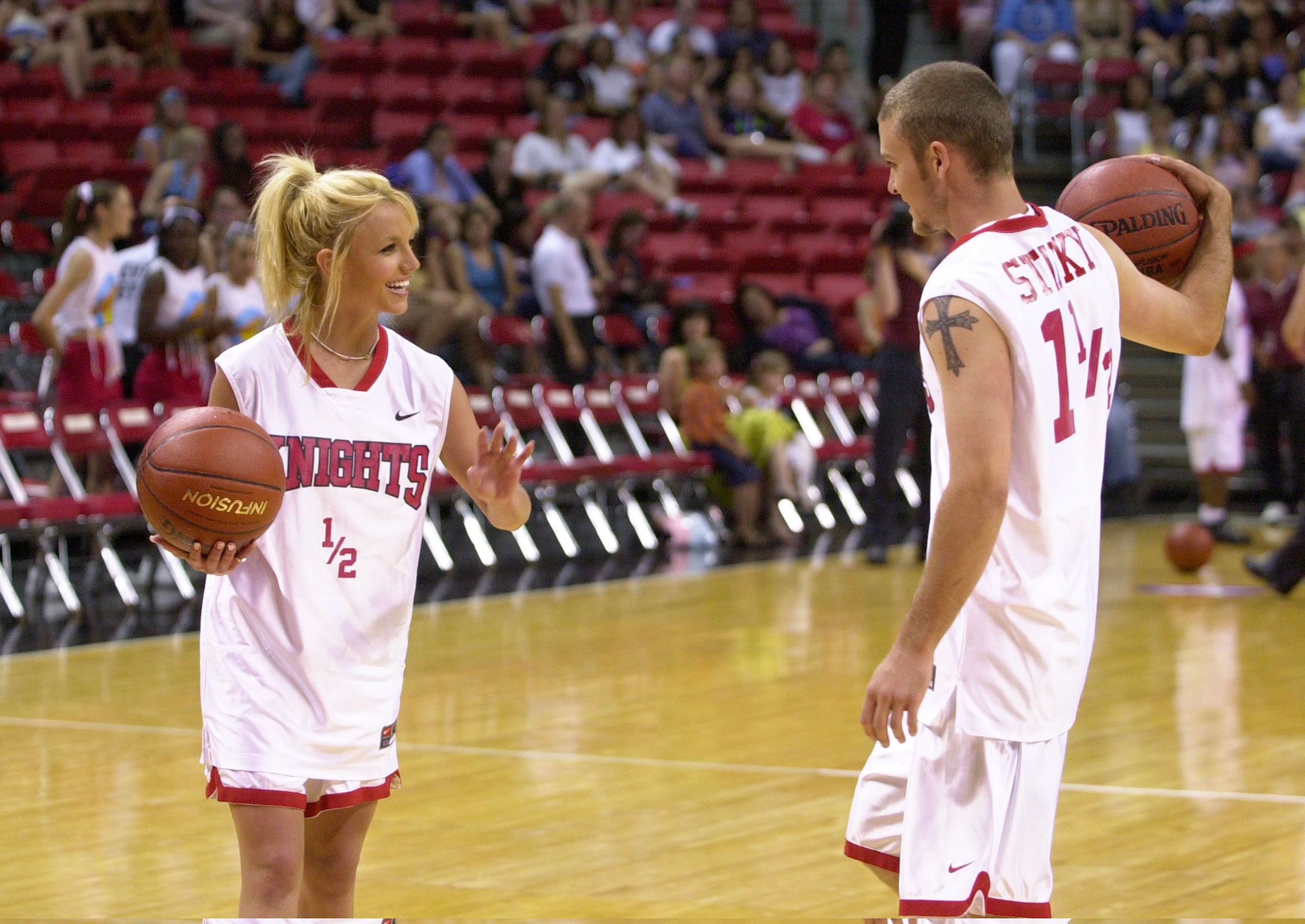 Spears and Timberlake at a basketball charity event in 2001.