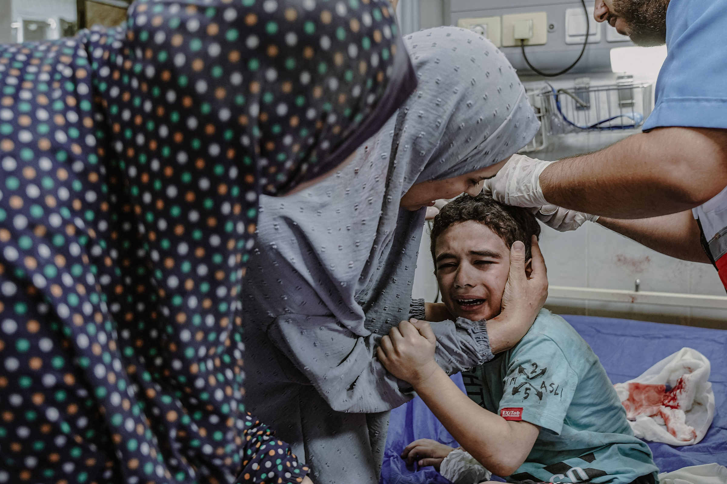 Injured Palestinian children at Al Quds hospital on the sixth day of the war, Oct. 13.