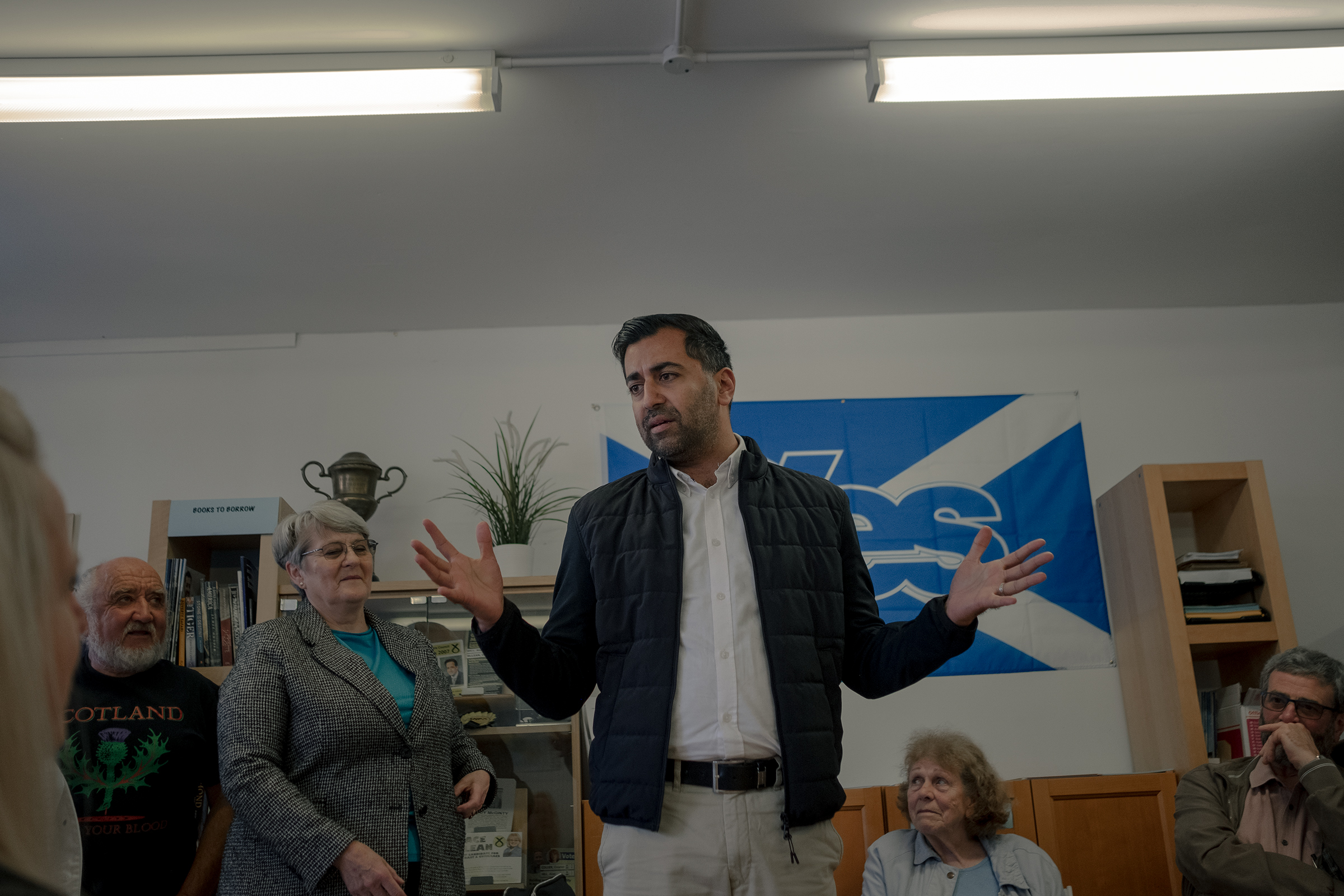 Yousaf speaks to supporters at the SNP office in Largs, Scotland, on Aug. 23. (Gabriella Demczuk for TIME)