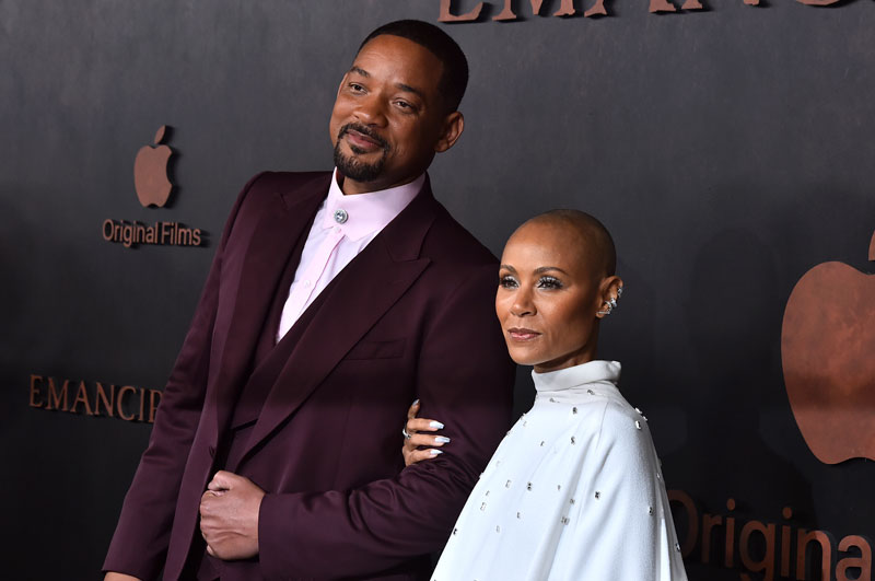 Will Smith, left, and Jada Pinkett Smith arrive at the premiere of “Emancipation”