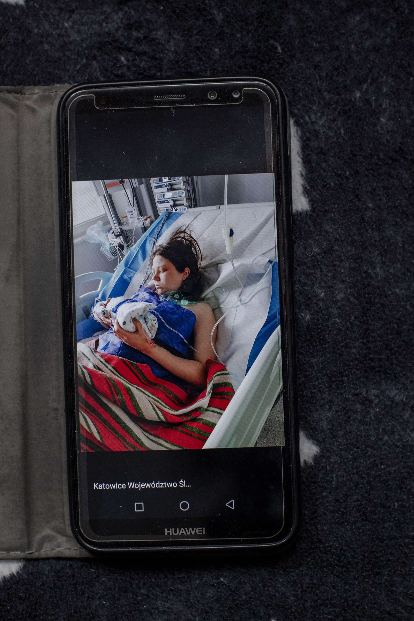 The last photo Krzysztof took of Marta and their son Wiktor, right after he was delivered stillborn.