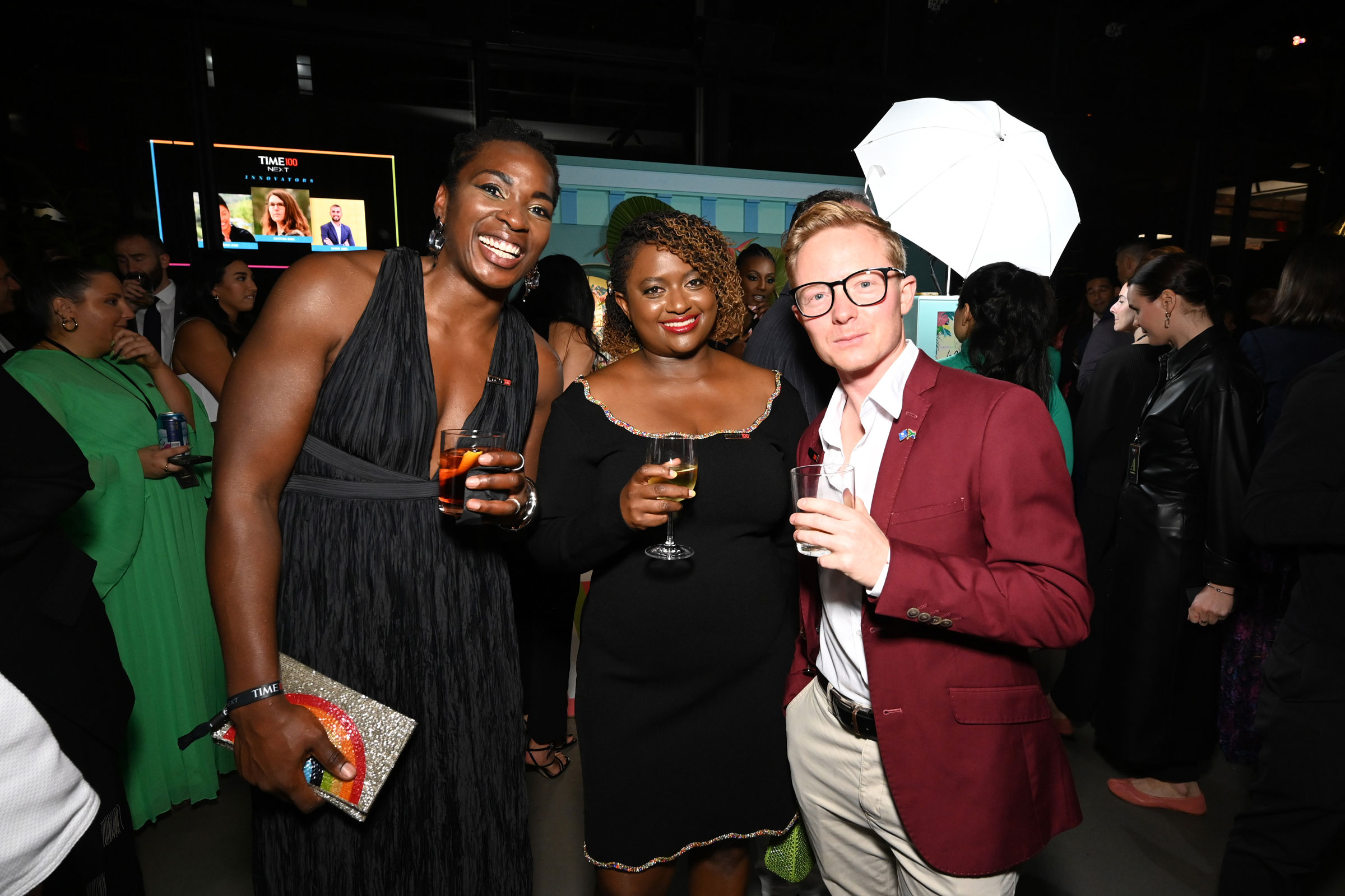 Toyin Ajayi, Mercy Mutemi, and Chris Pappas attend the 2023 TIME100 Next Gala at Second Floor in New York City, on Oct. 24, 2023. (Slaven Vlasic—Getty Images for TIME)