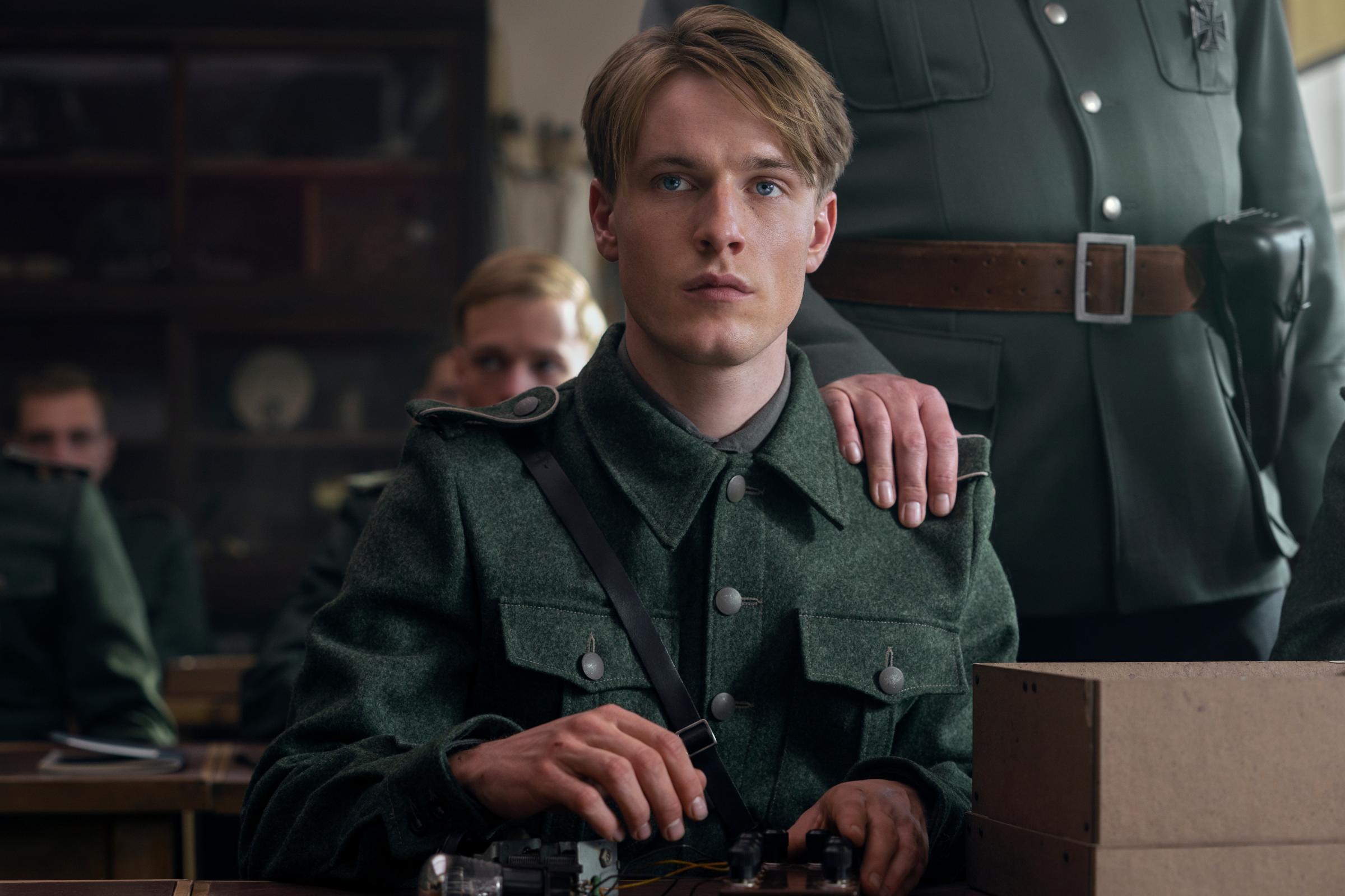 All the Light We Cannot See. Louis Hofmann as Werner Pfennig in episode 103 of All the Light We Cannot See. Cr. Katalin Vermes/Netflix © 2023