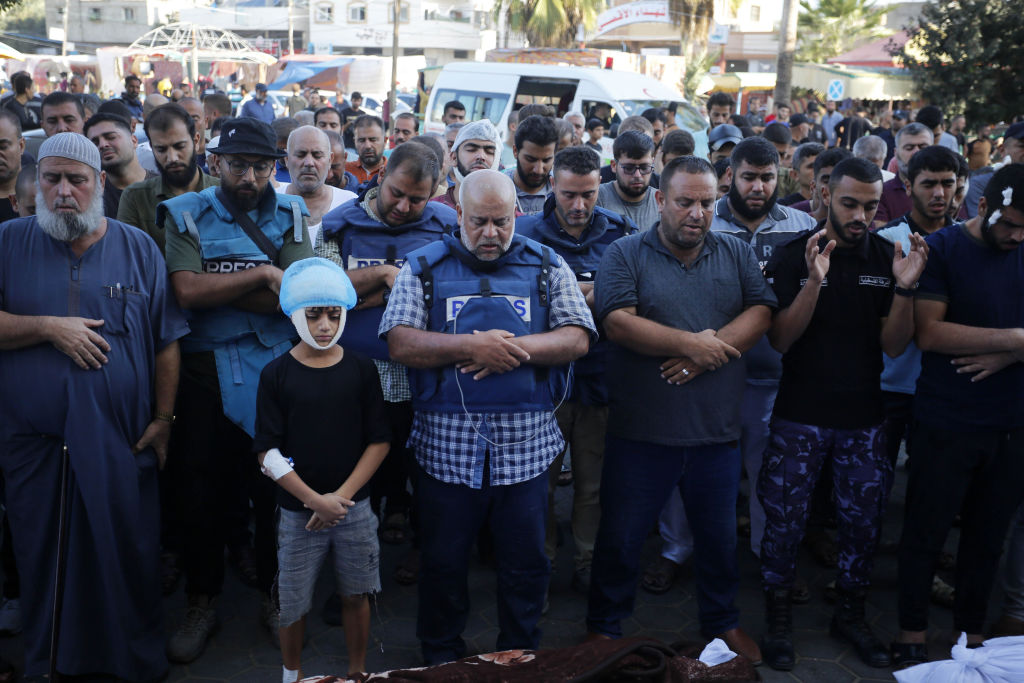 Funeral ceremony of Al Jazeera correspondent Wael al-Dahdouh's family after Israeli strike