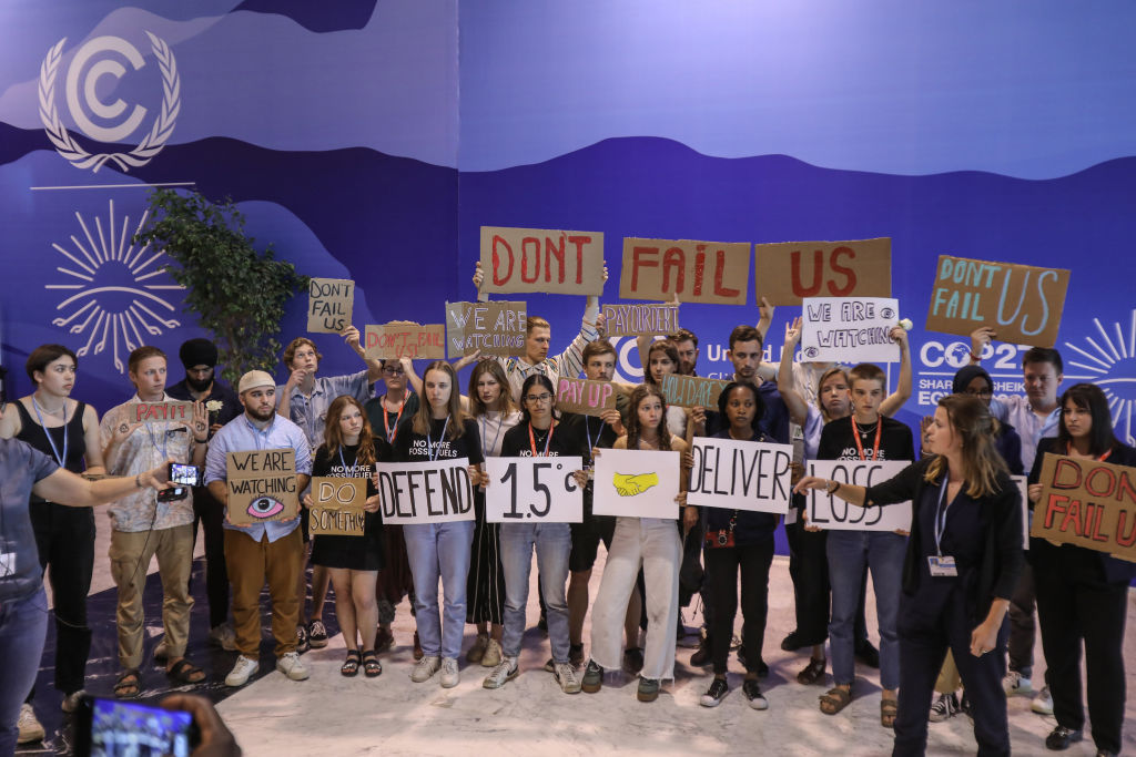 Climate activists protest at COP27 in Sharm el-Sheikh, Egypt, on Nov 19, 2022.