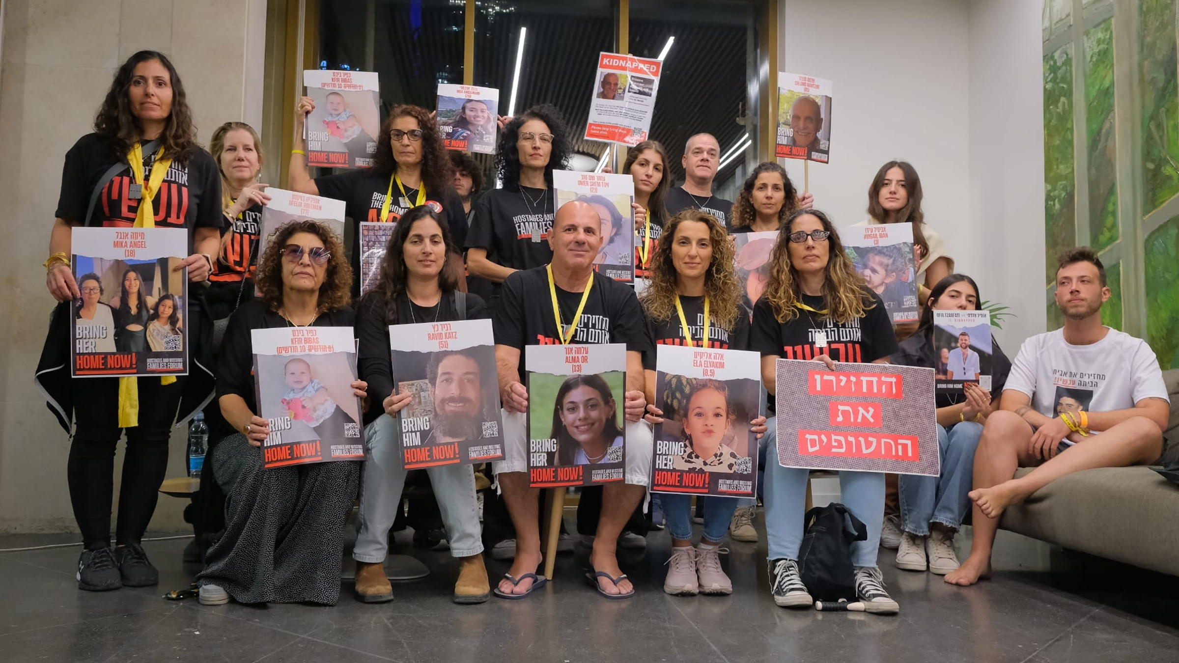 Eyal Nouri, center, and his family, rally to urge the release of all hostages, in Tel Aviv on Nov. 25.
