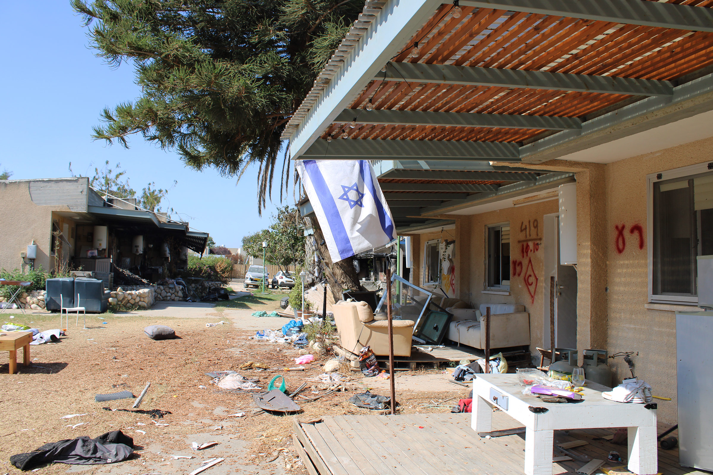 A row of destroyed homes inside the kibbutz Kfar Aza, in Israel, Oct. 31, 2023.