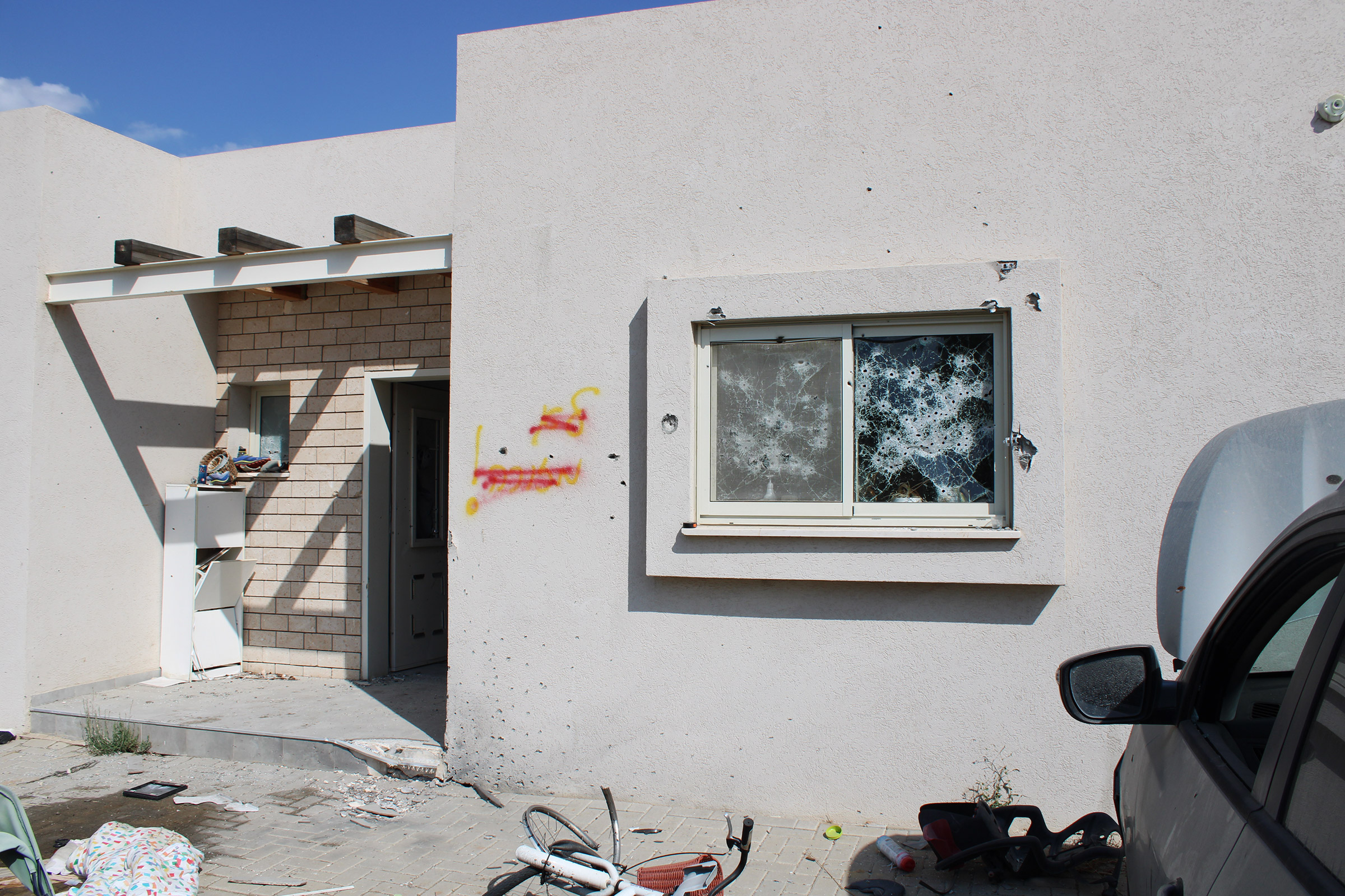 The outside of a home in Kfar Aza that was attacked by Hamas fighters on Oct. 7.
