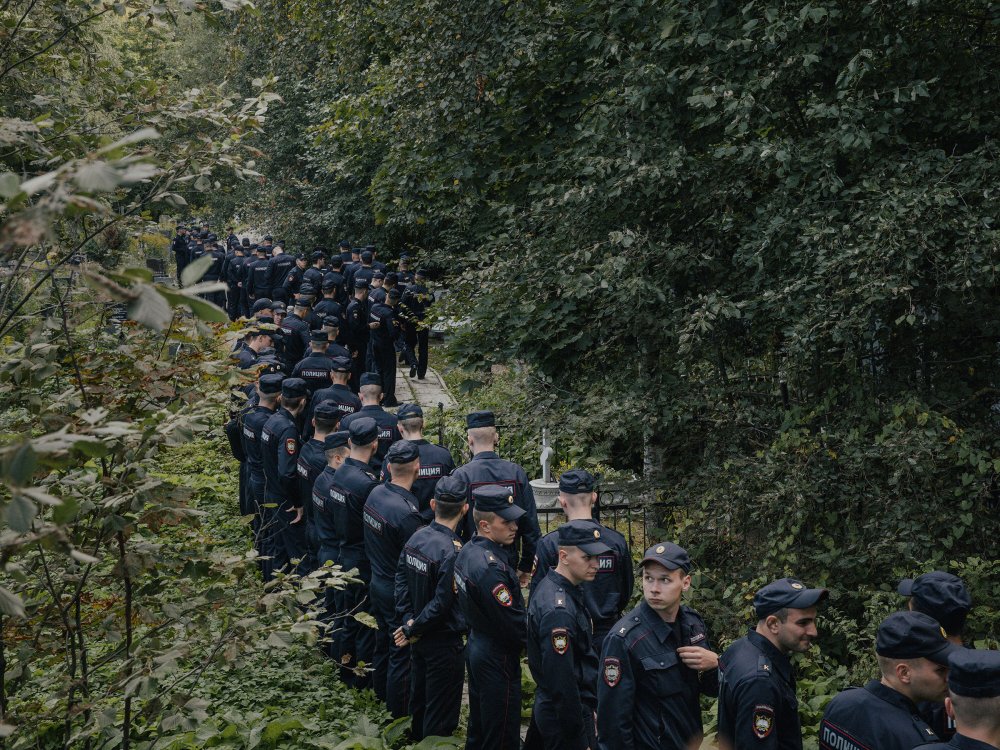 Police officers at the Porokhovskoye cemetery, where the press service owned by Yevgeny Prigozhin said he was buried Tuesday, in St. Petersburg, Russia, Aug. 29, 2023