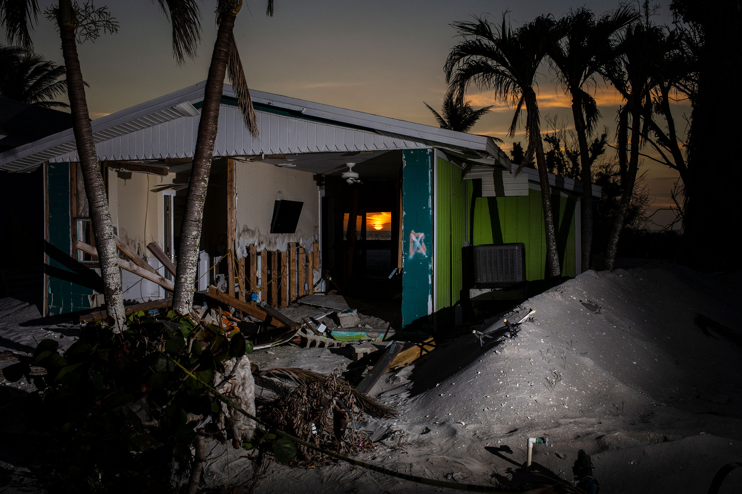 The remains of a beach home months after it was destroyed by Hurricane Ian on Captiva Road in Sanibel, Fla. on Feb. 9.