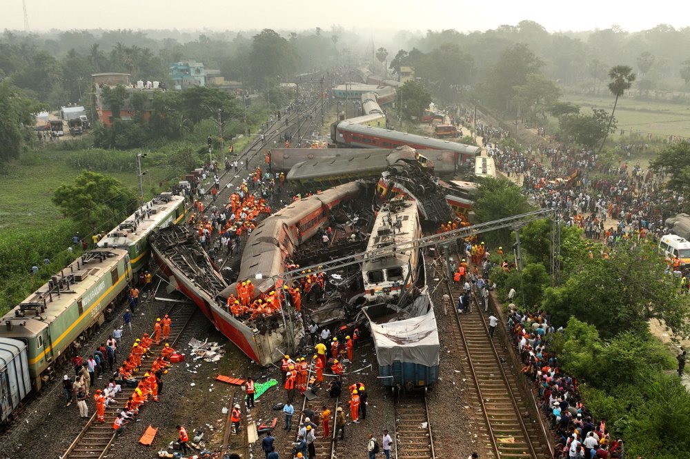 Rescuers work at the site of a passenger train accident in Balasore district, in the eastern Indian state of Orissa, on June 3, 2023. Two passenger trains derailed in India, killing more than 280 people. Hundreds of others were trapped inside more than a dozen mangled rail cars, in one of the country's deadliest train crashes in decades.