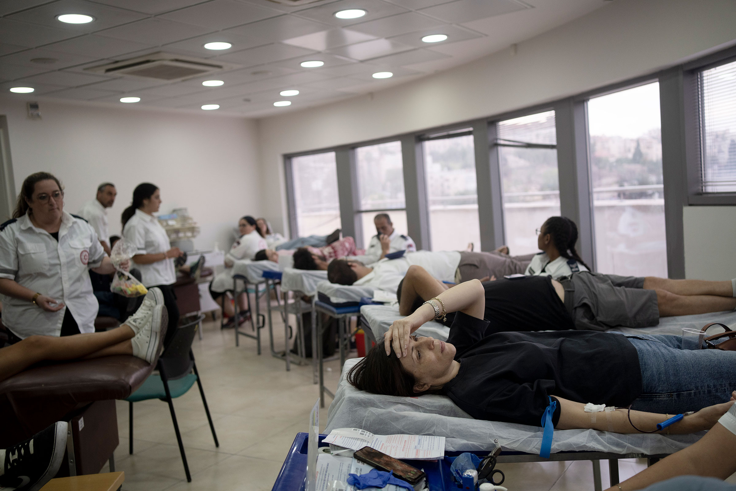 Israelis donate blood at Magen David Adom emergency service in Jerusalem, following an unprecedented attack by Hamas militants on Israel, on Oct. 7.