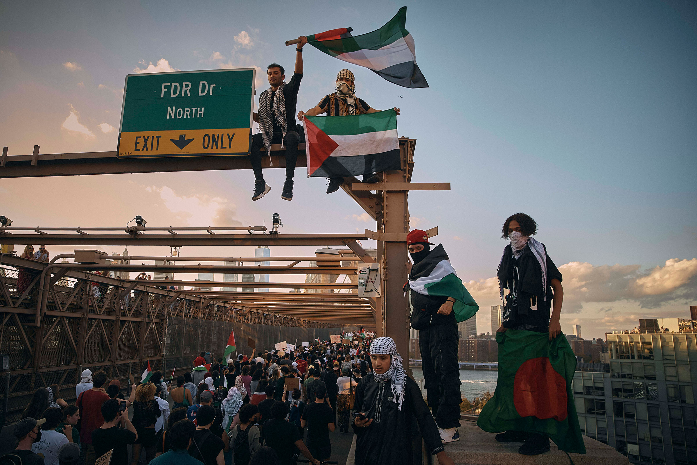 Protestors shout slogans as they cross the Brooklyn Bridge in New York during a Pro-Palestine demonstration demanding a ceasefire, on Oct. 28.
