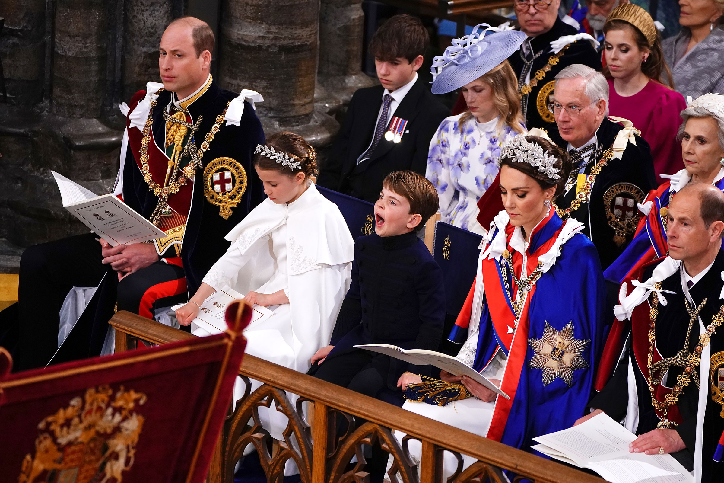 Britain's Prince William, Prince of Wales, Princess Charlotte, Prince Louis, and Britain's Catherine, Princess of Wales, attend the Coronation of King Charles III and Queen Camilla at Westminster Abbey in London on May 6. Charles acceded to the throne on Sept. 8, 2022, upon the death of his mother, Elizabeth II.