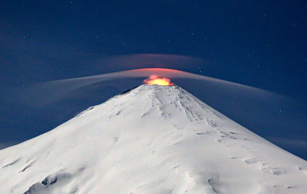 Villarrica volcano as seen from Villarrica, some 800 kilometres south of Santiago, Chile, on Sept. 27. Villarrica is among the most active volcanoes in South America.
