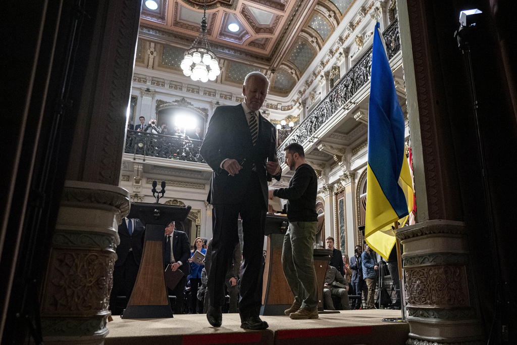 President Joe Biden and Ukrainian President Volodymyr Zelensky depart a news conference at the White House, Tuesday, Dec. 12, 2023. (Andrew Harnik—AP)