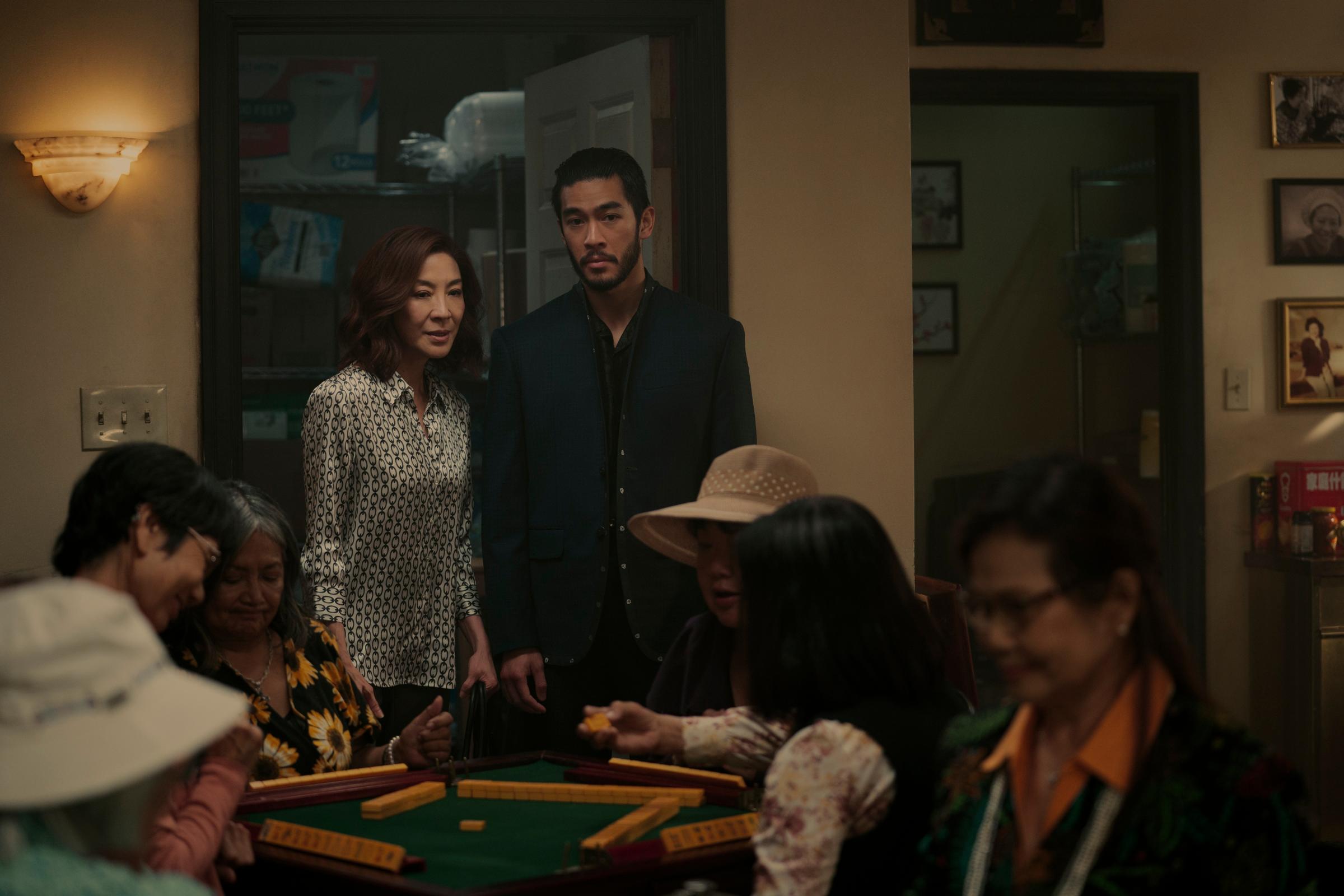 The Brothers Sun. (L to R) Michelle Yeoh as Mama Sun, Justin Chien as Charles Sun in episode 103 of The Brothers Sun. Cr. Michael Desmond/Netflix © 2023