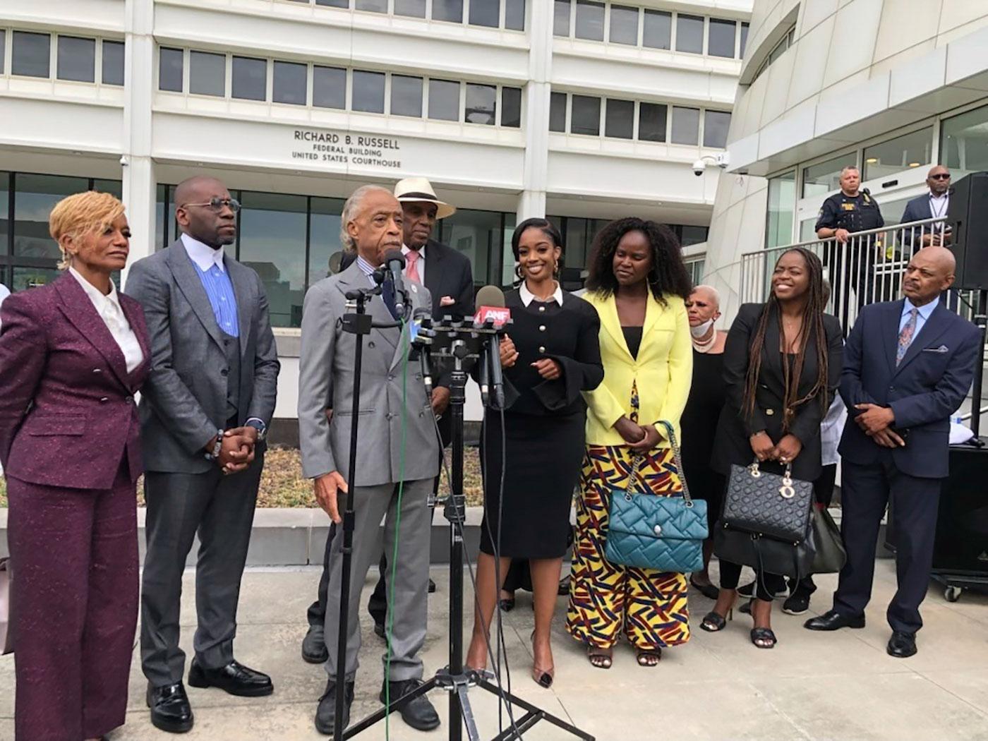 The Rev. Al Sharpton speaks outside the Richard B. Russell federal courthouse in Atlanta, on Tuesday, Sept. 26, 2023. To his left in the black dress is Fearless Fund CEO and co-founder Arian Simone.
